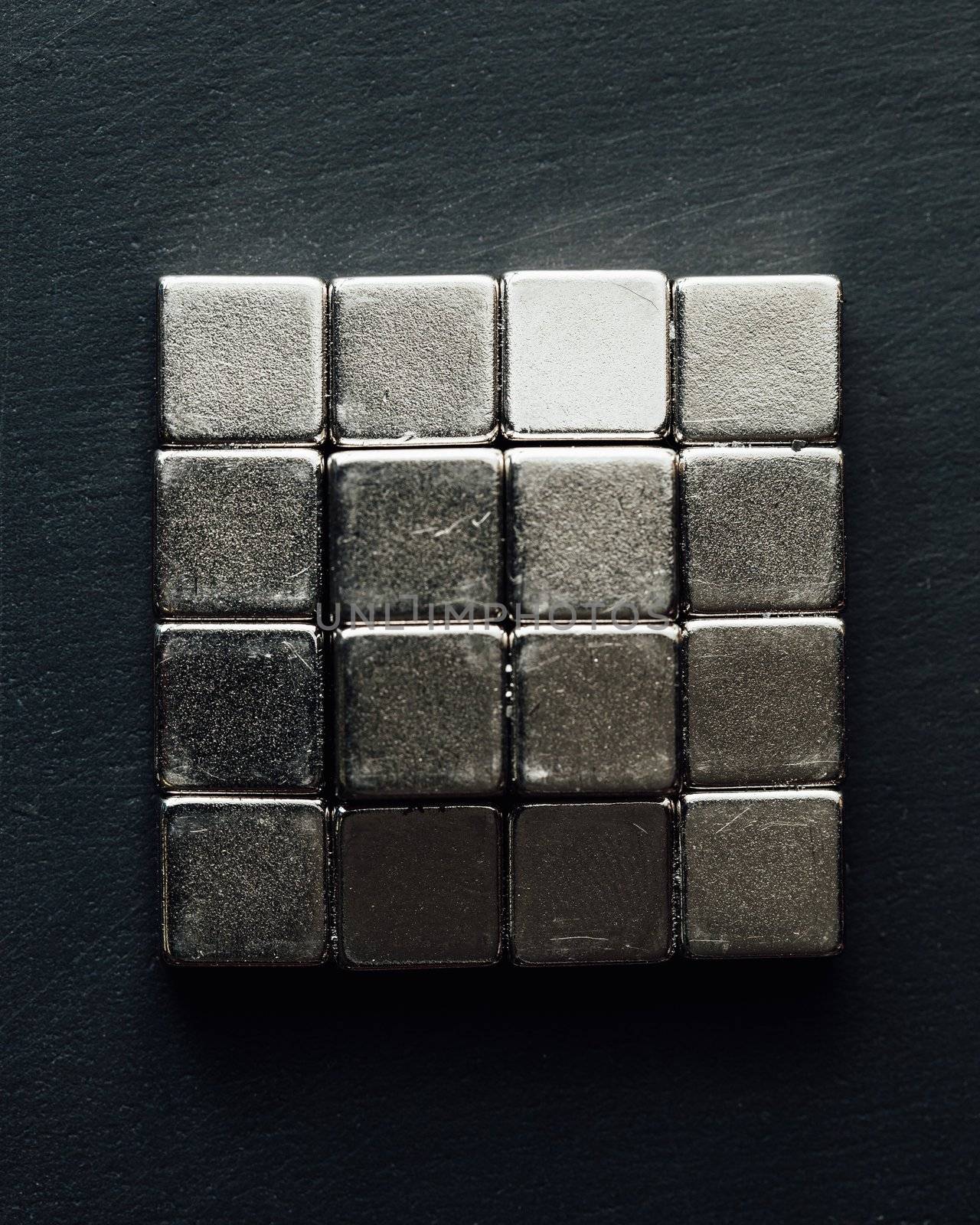 neodymium magnets squares, black background by nikkytok