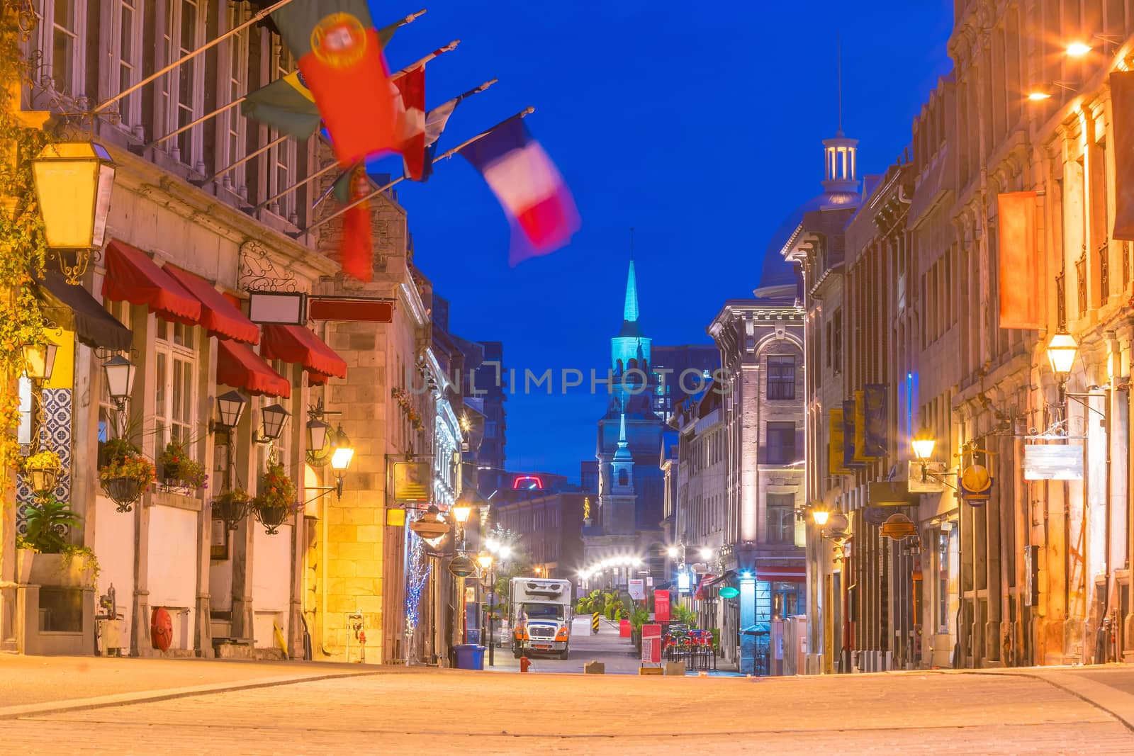 Old town Montreal at famous Cobbled streets at twilight by f11photo