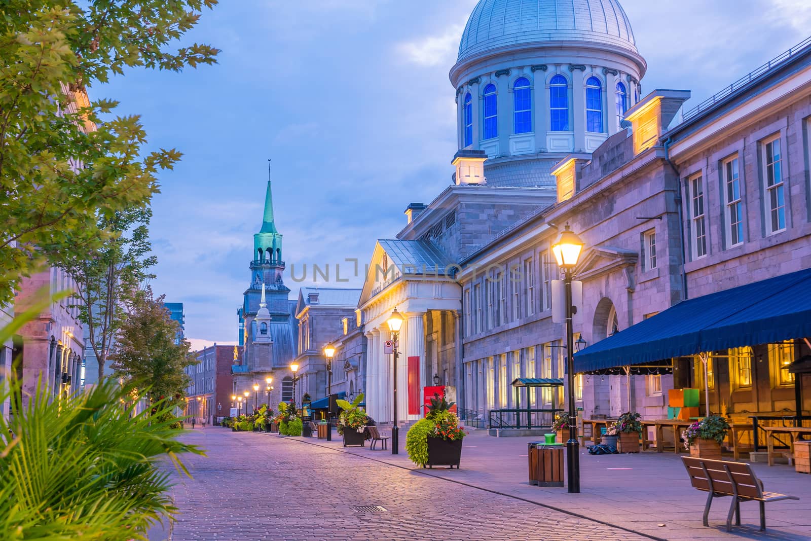 Old town Montreal at famous Cobbled streets at twilight by f11photo