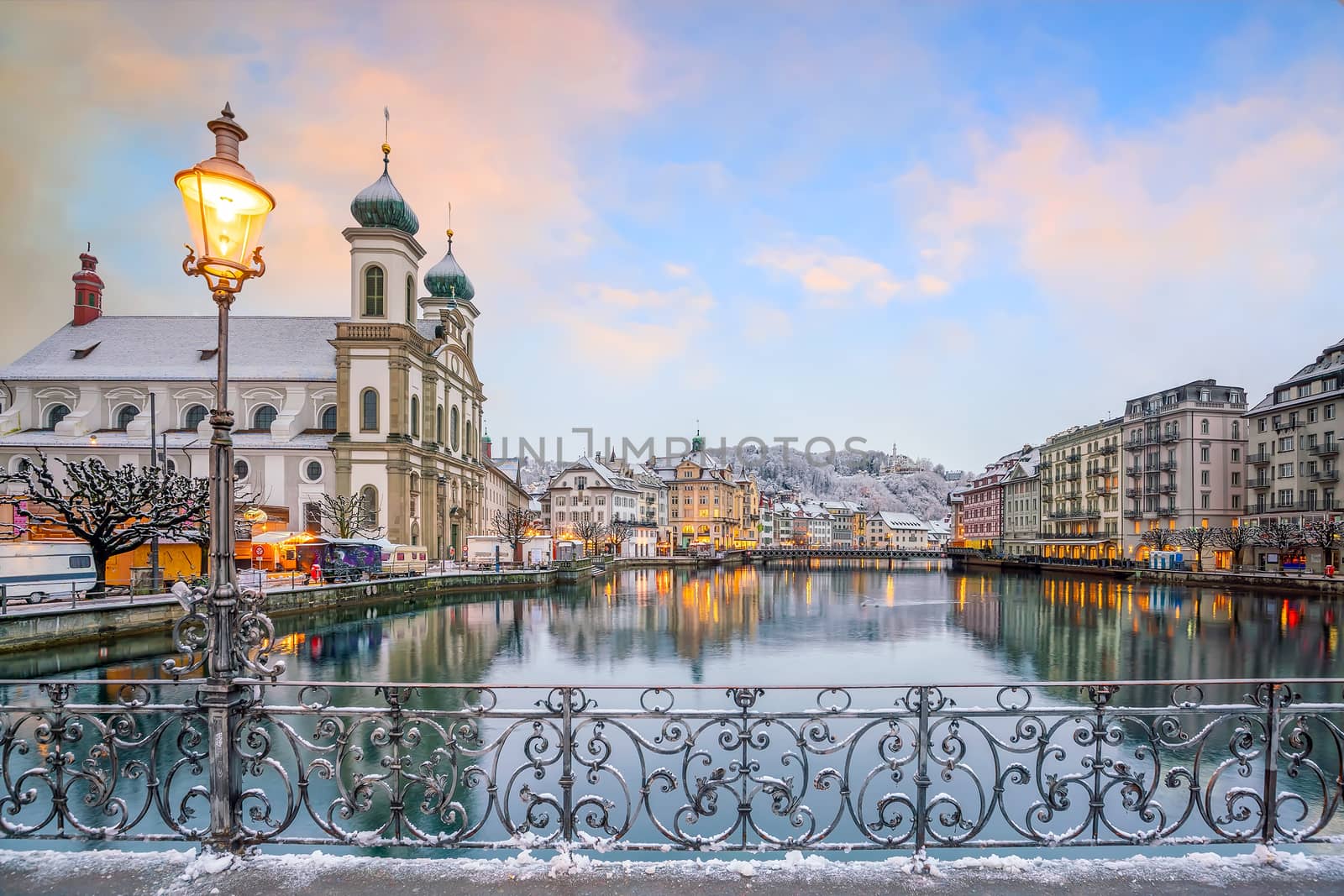 Historic city center of downtown Lucerne with  Chapel Bridge and by f11photo