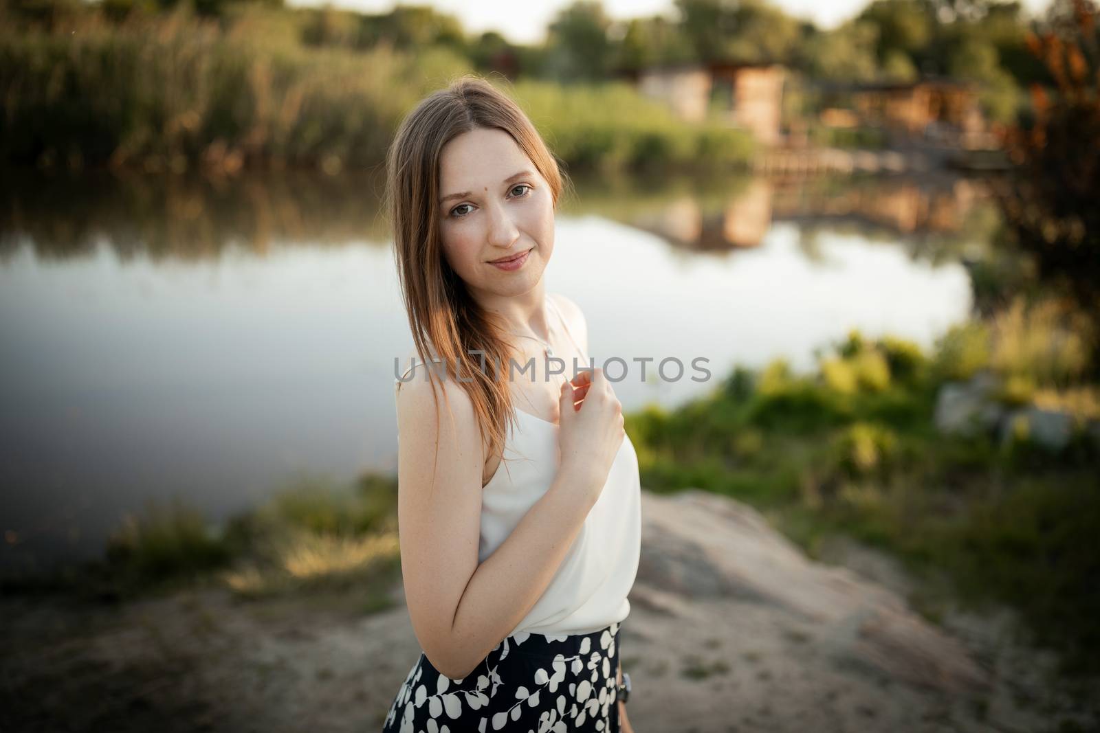 Beautiful girl outside. In the park. On nature