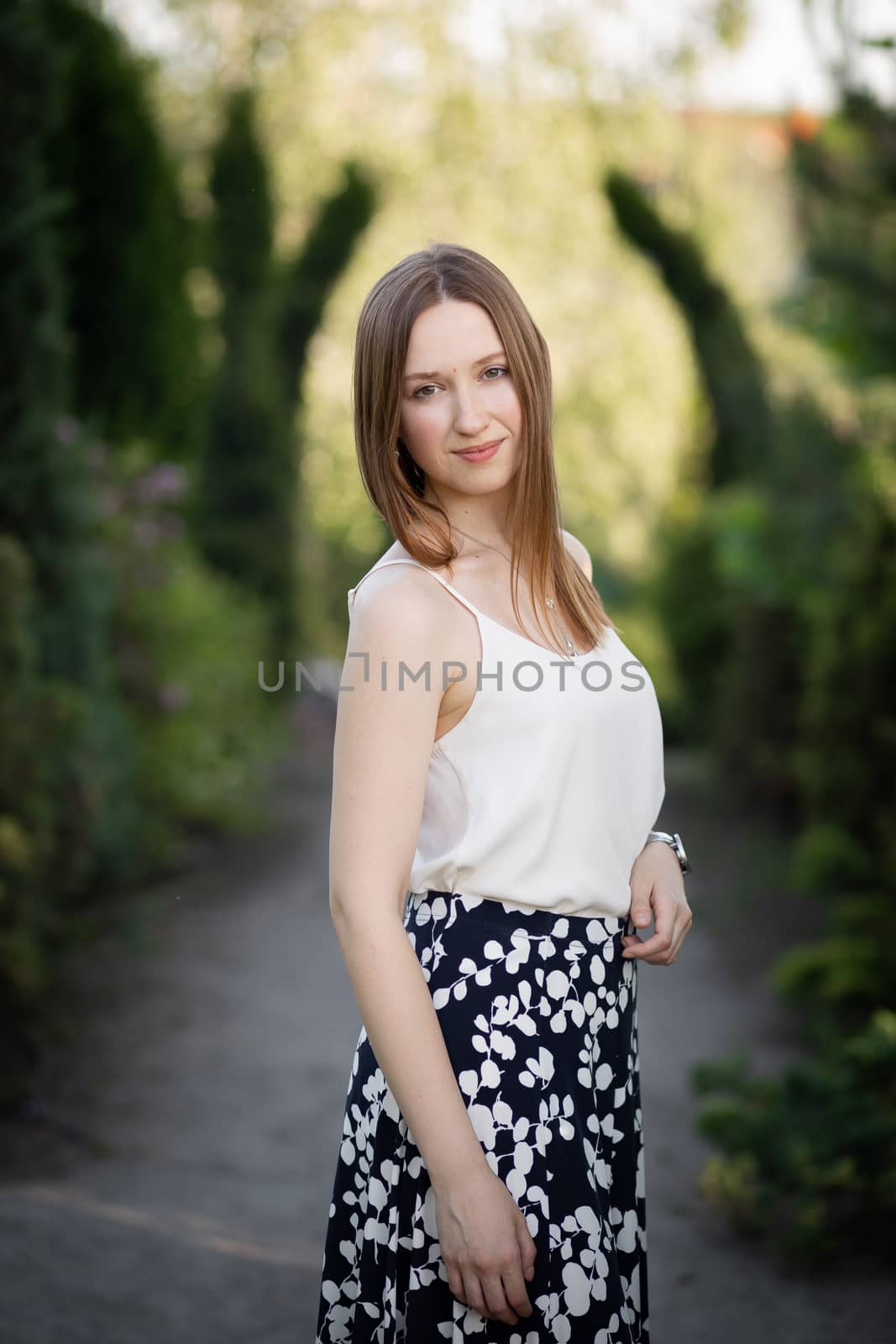 Beautiful girl outside. In the park. On nature