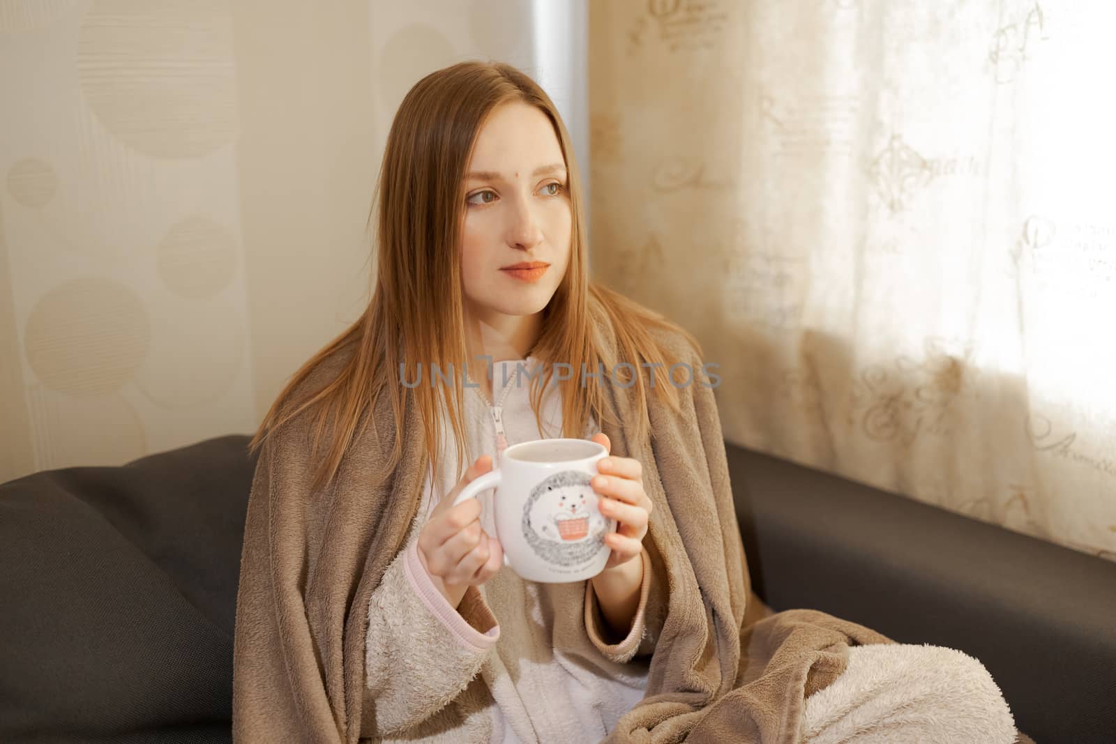 girl with a cup of coffee	or tea