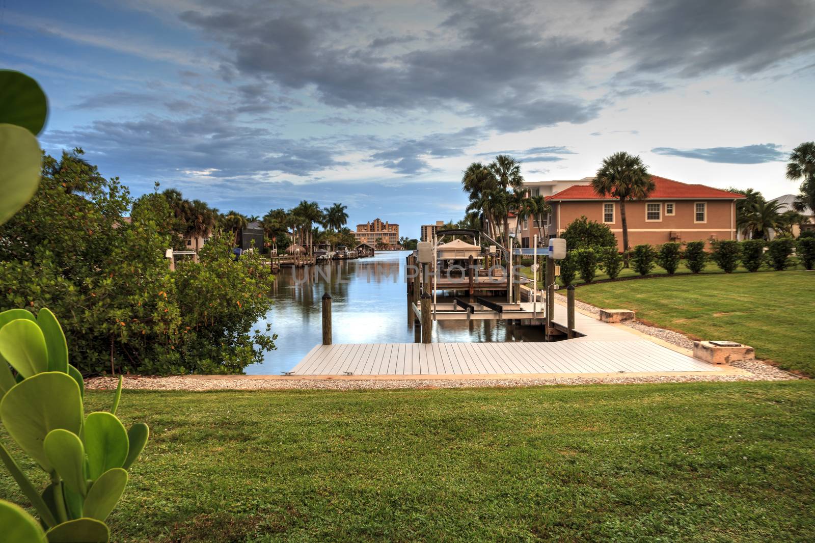 Sunrise over a Waterway leading to the Ocean near Vanderbilt Beach in Naples, Florida.