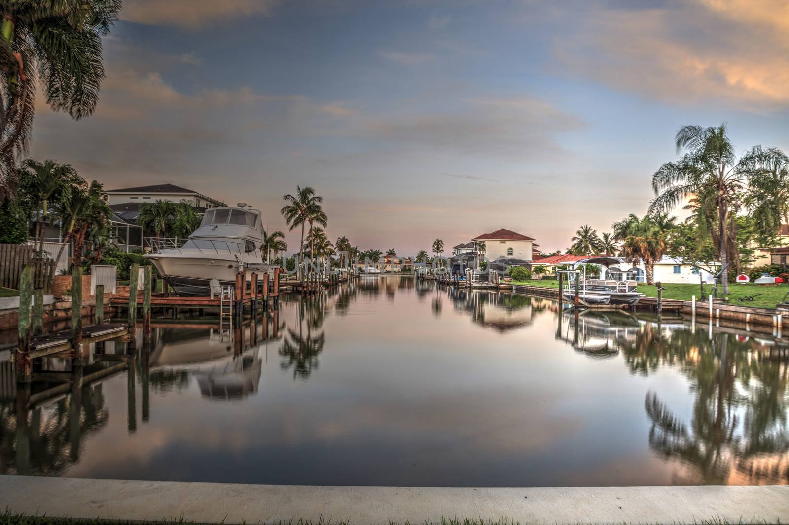 Sunrise over a Waterway leading to the Ocean near Vanderbilt Beach in Naples, Florida.