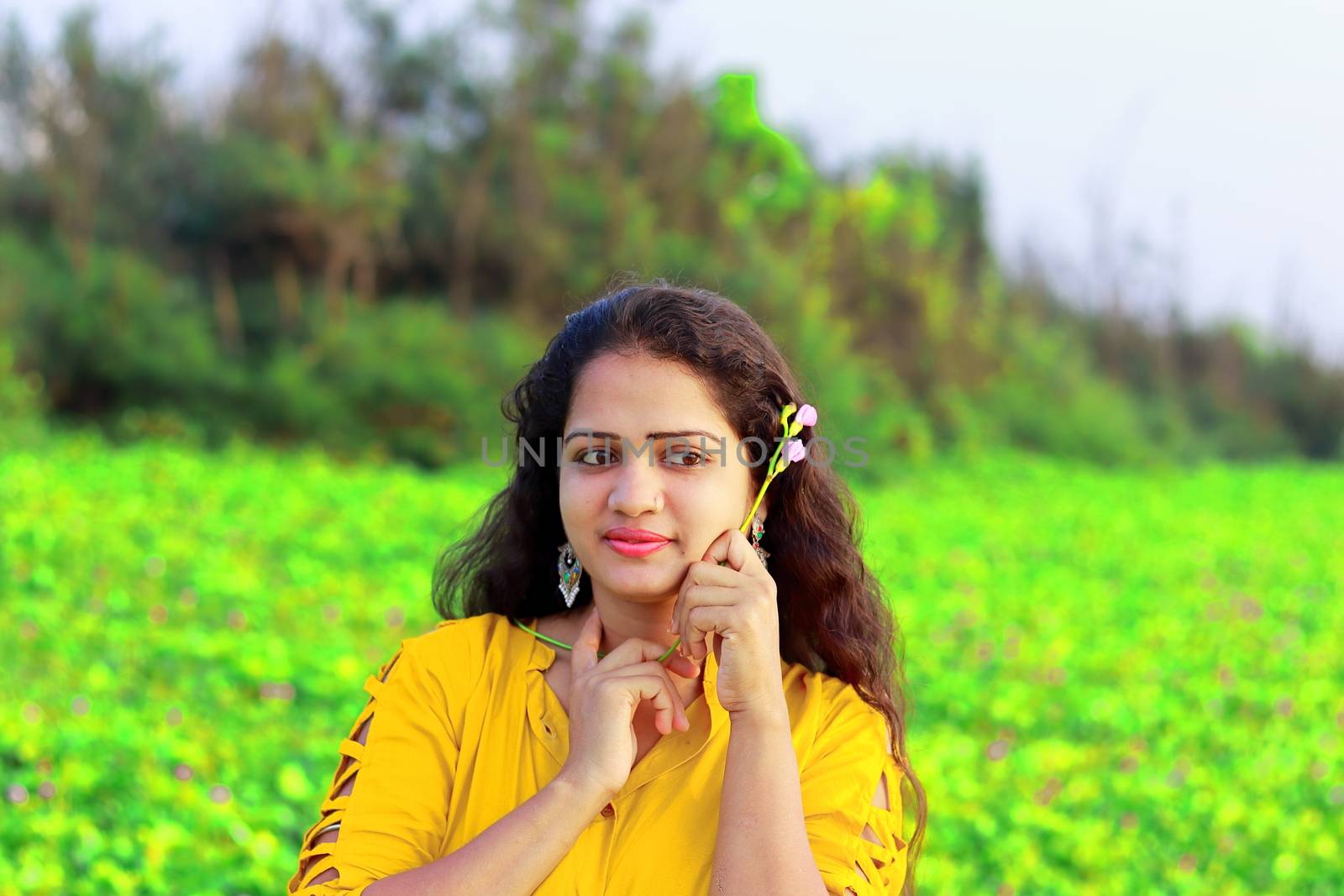 a stylish fair girl with blur green background,nature lover, by 9500102400