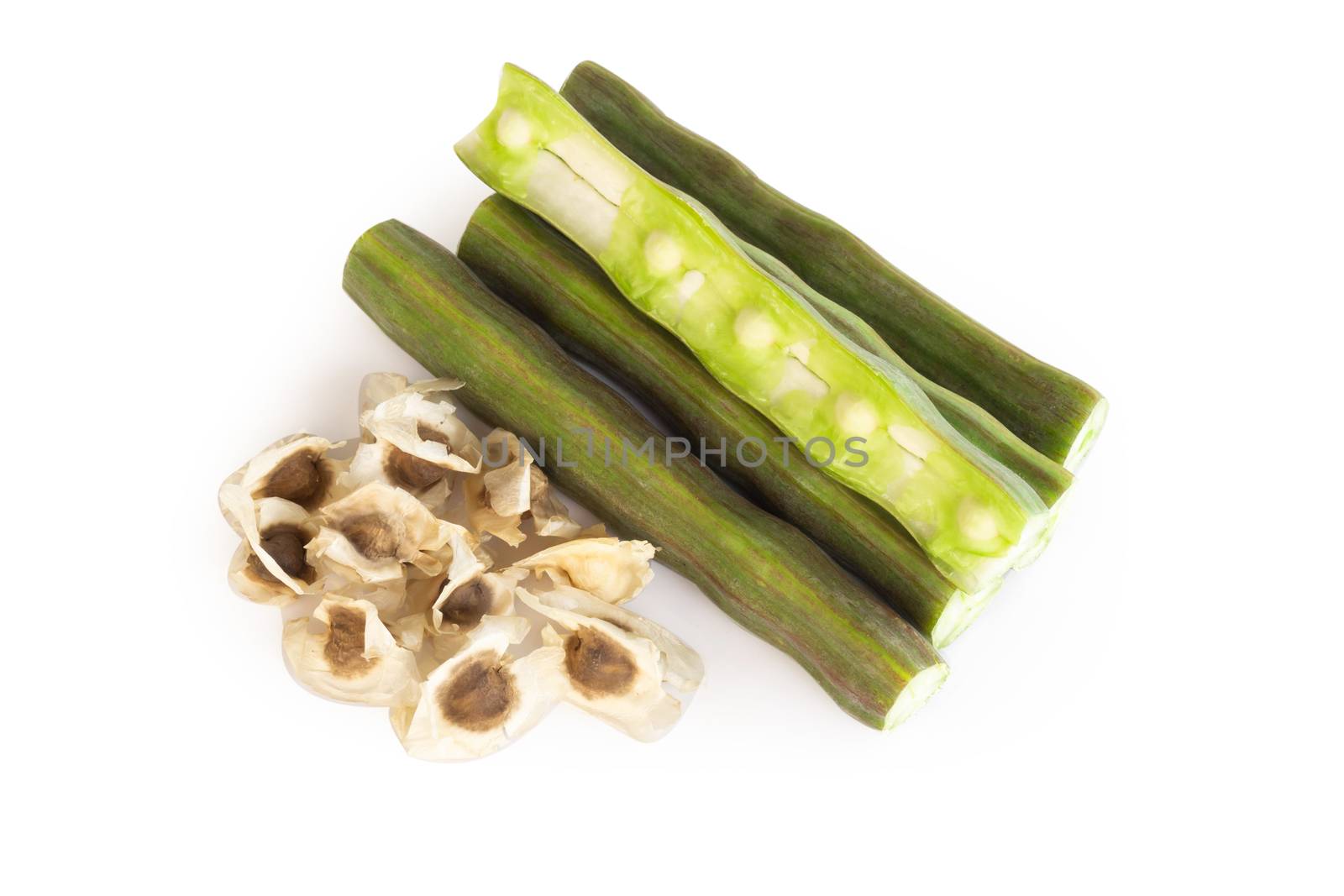 Moringa seeds and pods isolated on white background, herb and medical concept