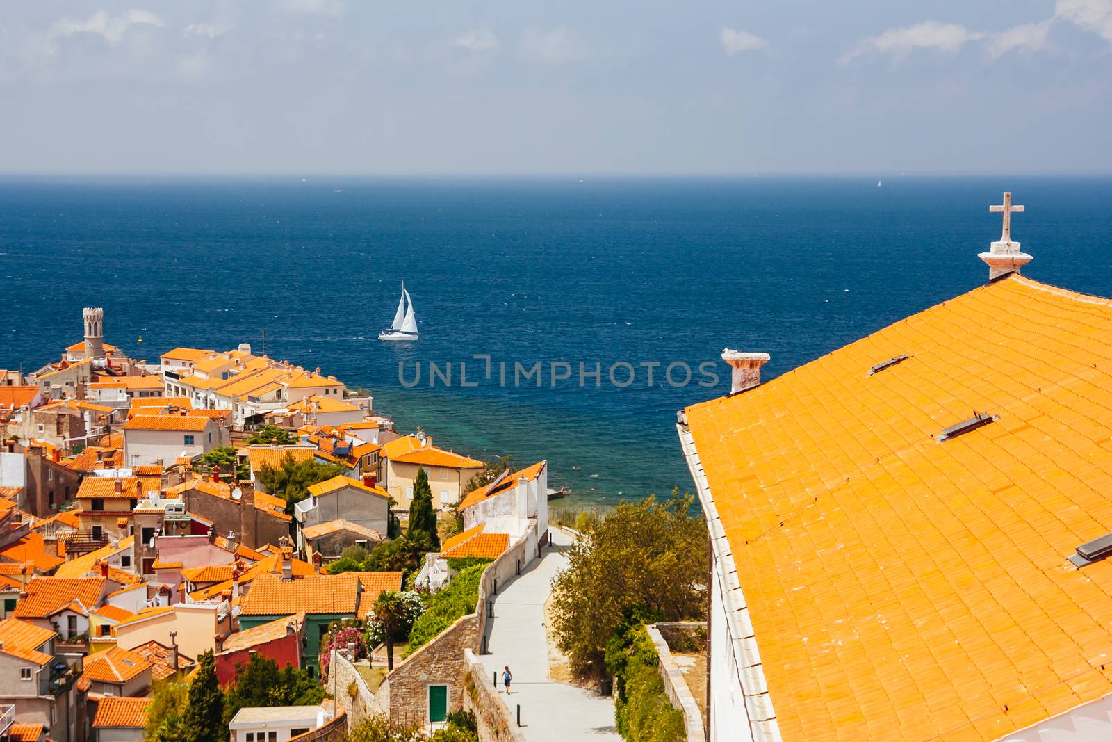 Quaint streets and rooftops on a hot summer's day in the iconic town of Piran in Slovenia