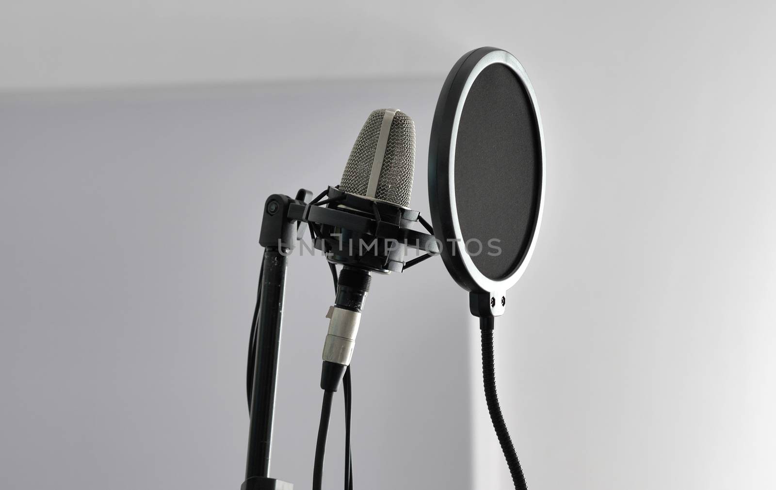 Studio microphone and pop filter by HD_premium_shots