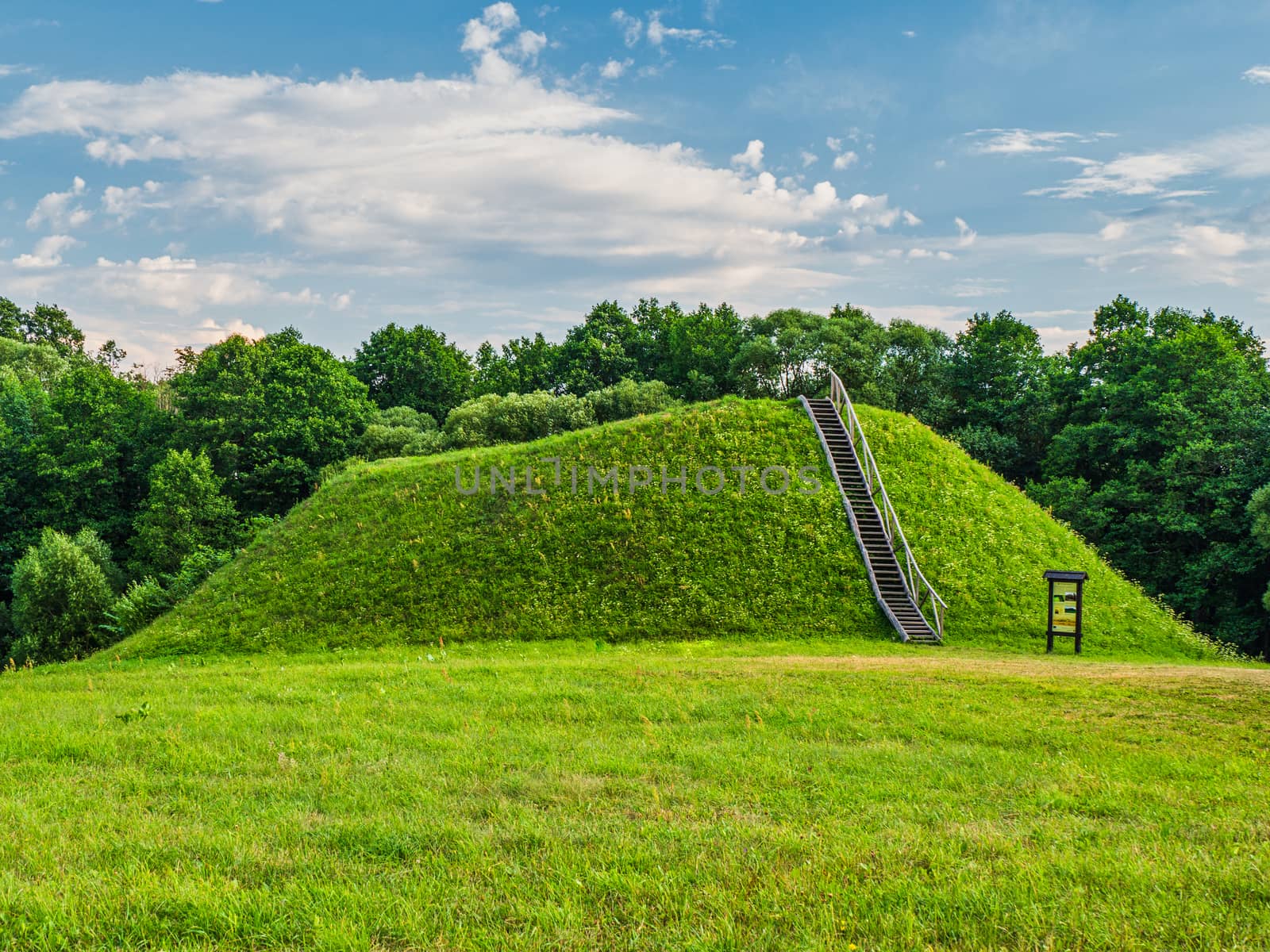 Wooden Stairs to The Top of The Mound. Historic Burial Mound, Lithuania.
