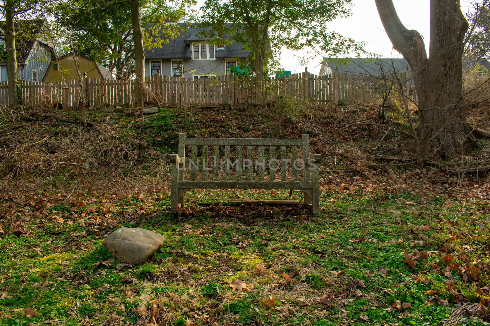 An Old Wooden Park Bench in a Suburban Park in Pennsylvania by bju12290