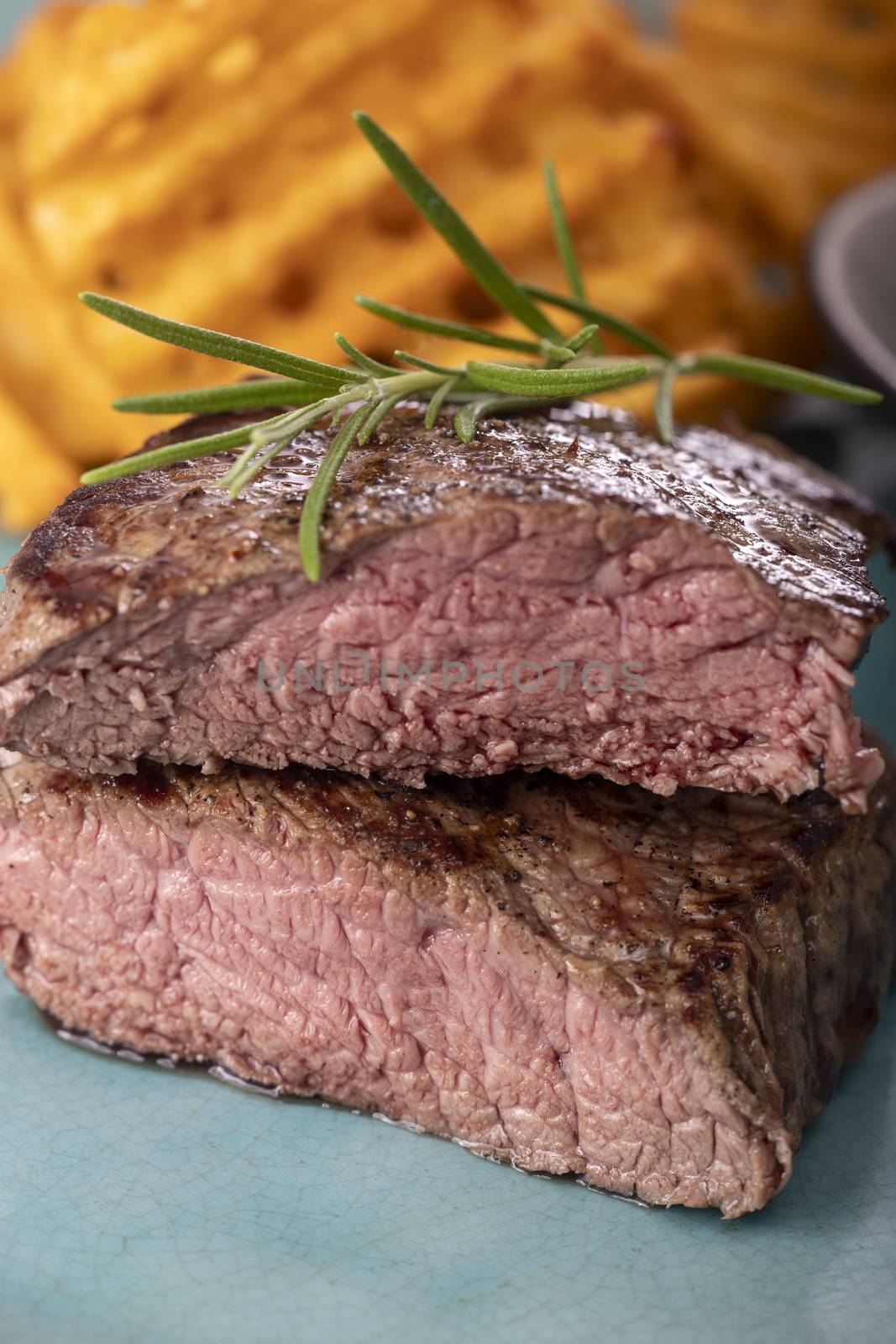 grilled steak with fresh potato lattices