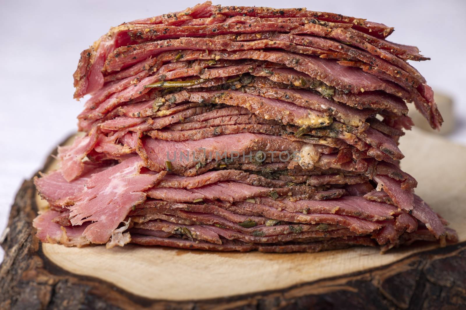 stack of sliced pastrami meat