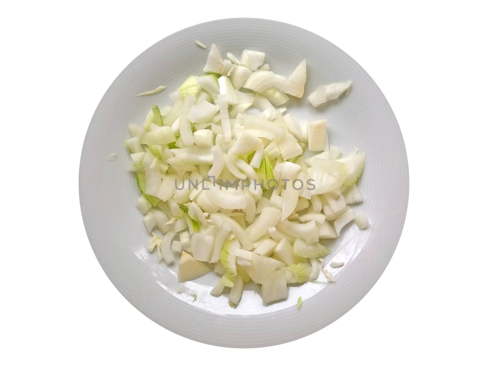 Onion cut off into a plate on white background