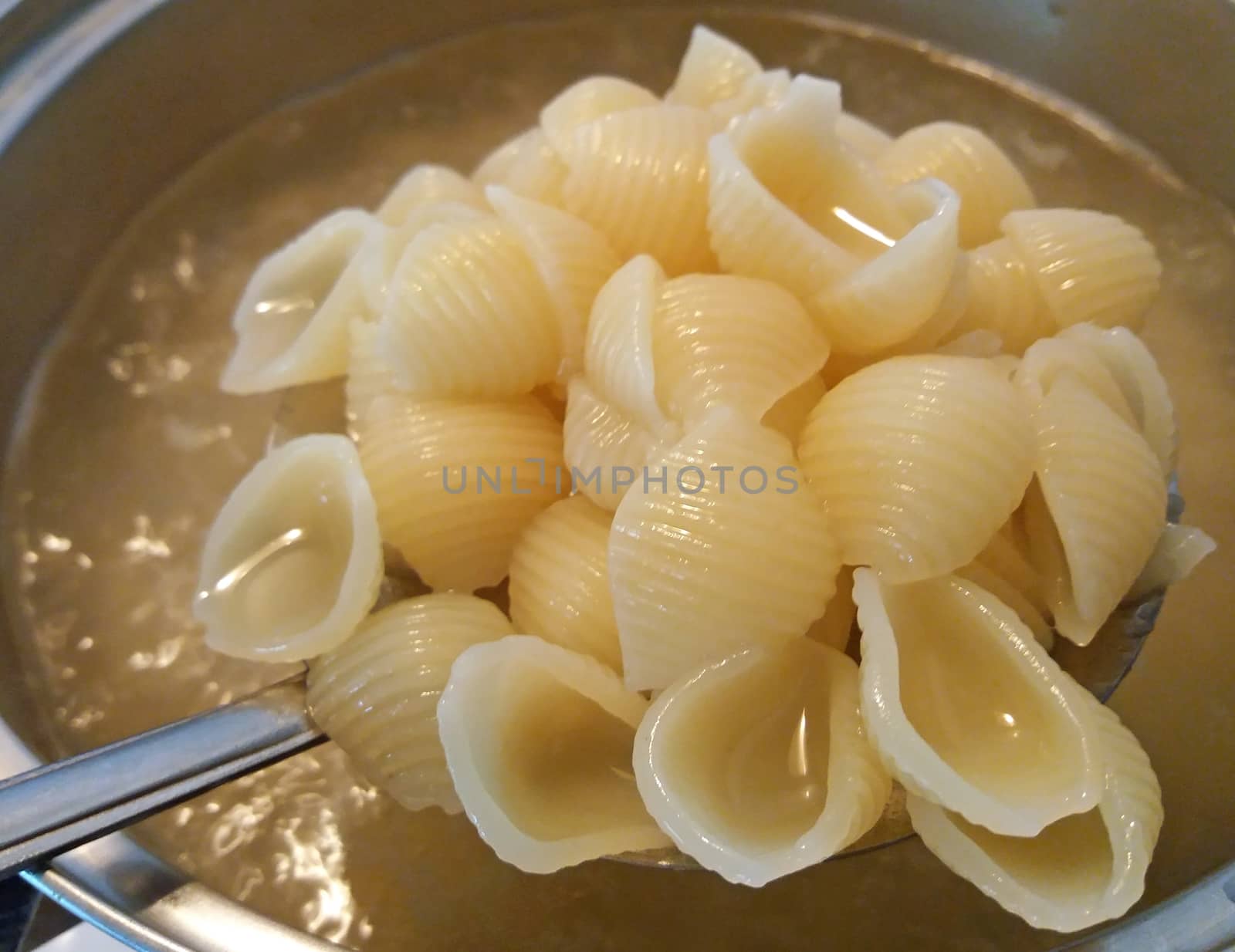 I am kooking pasta, close up photo by Mindru
