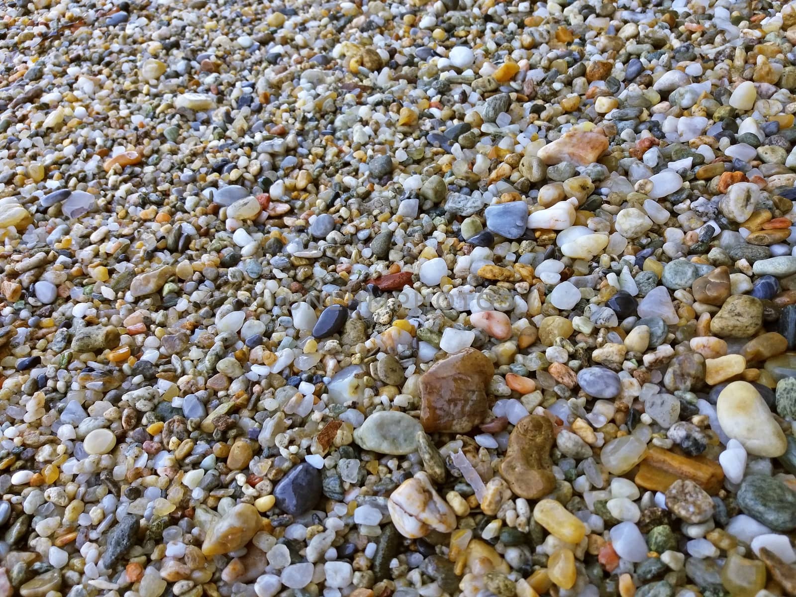 Beautiful sea glass texture, at the Mediteranean beach in Greece