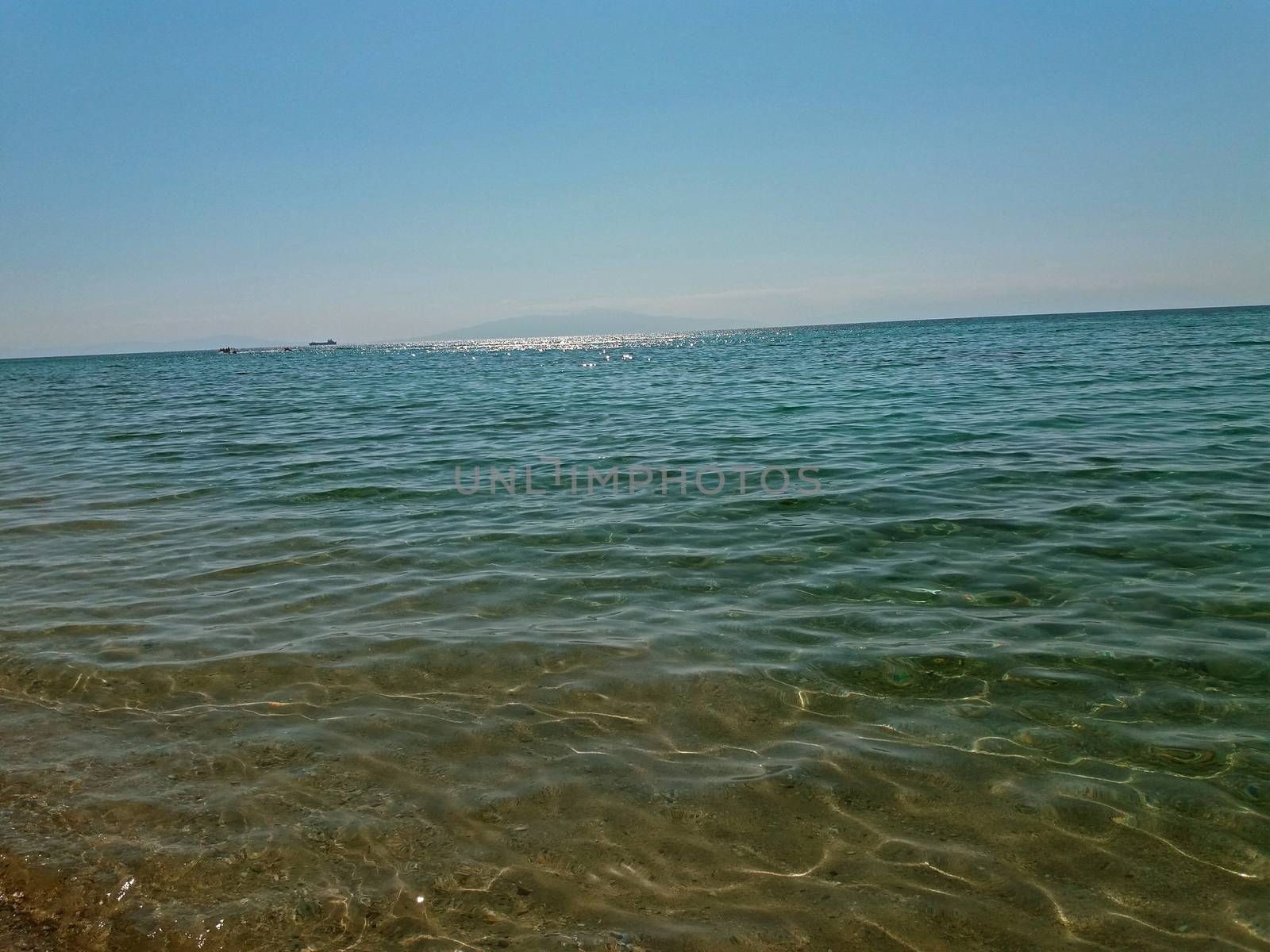 The Mediterranean Sea in Greece and clear sky by Mindru