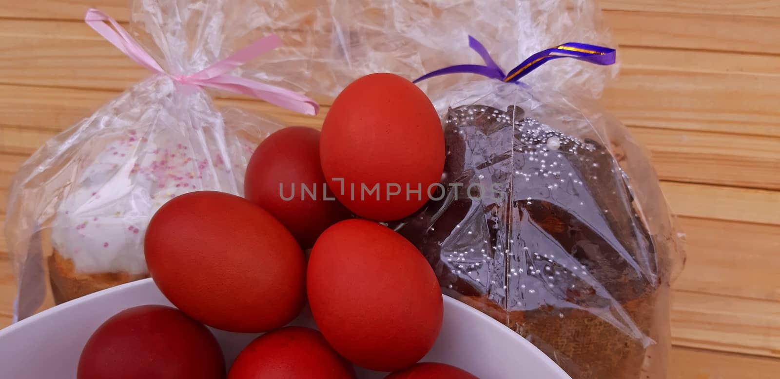 Easter red eggs and cakes. Easter holyday concept.