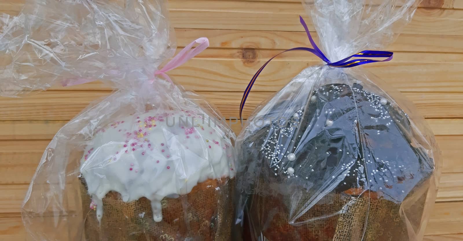 Easter cakes close up on wooden background.