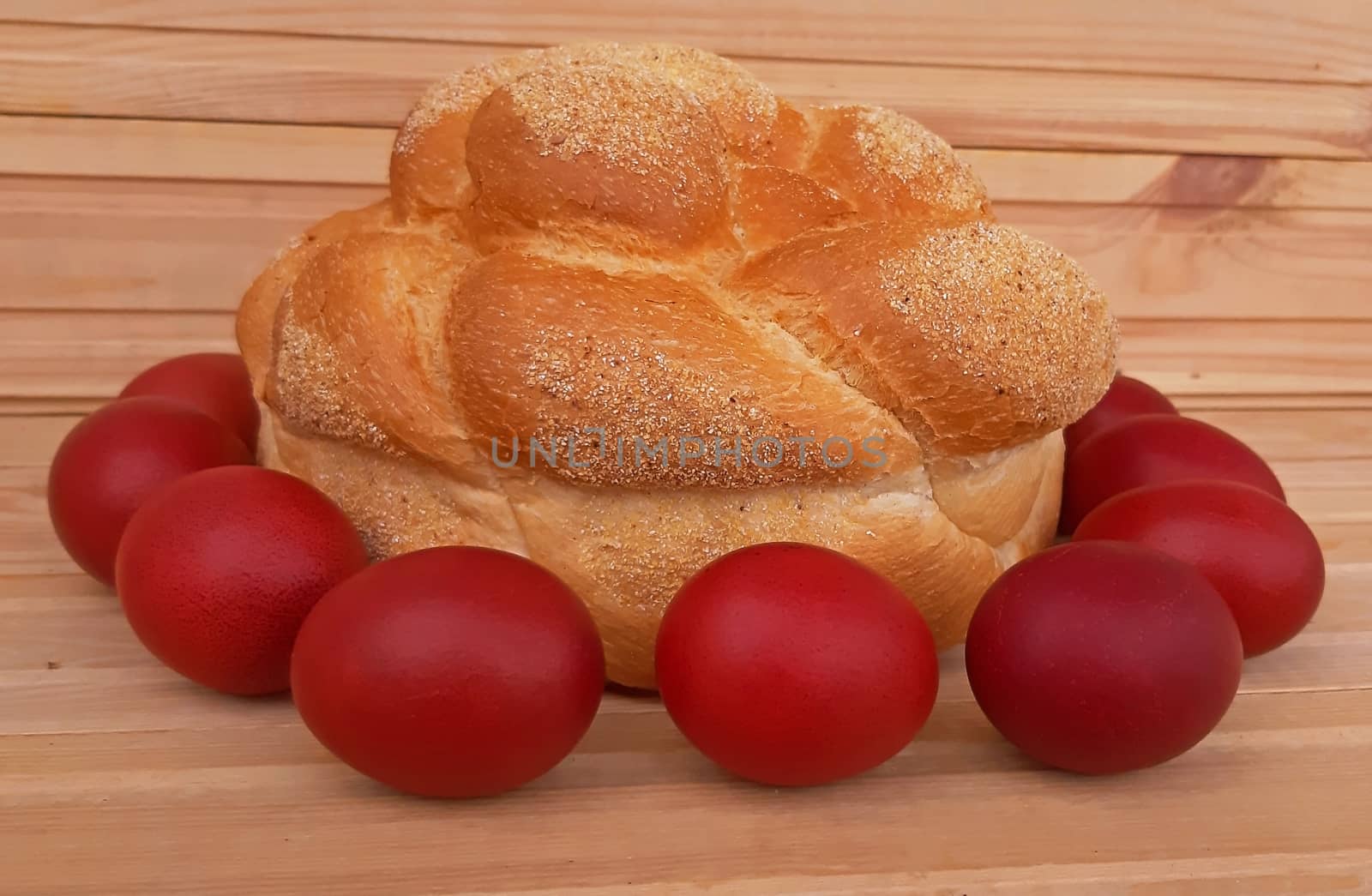Easter red eggs and homemade bread. Easter concept.
