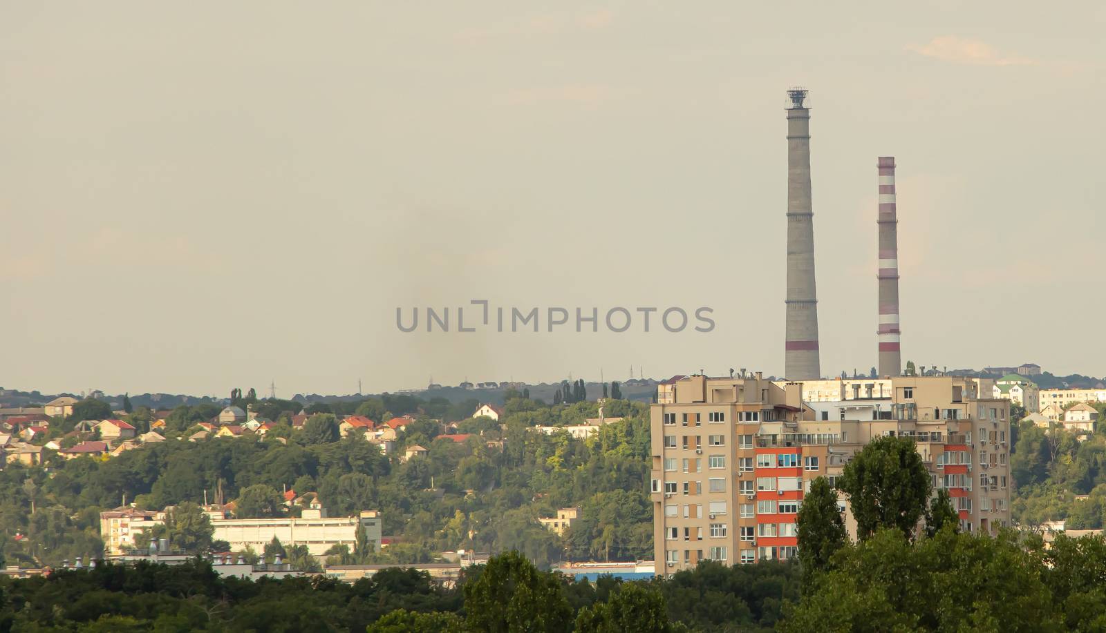 Heat and power factory chimney in the city by Mindru