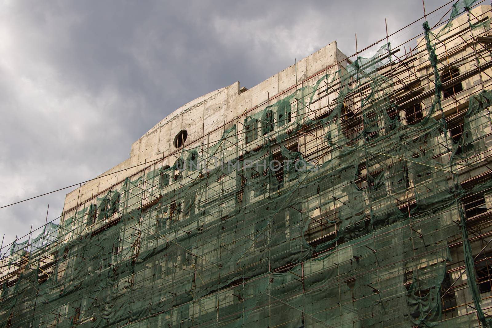 City old building under construction. exterior renovation.