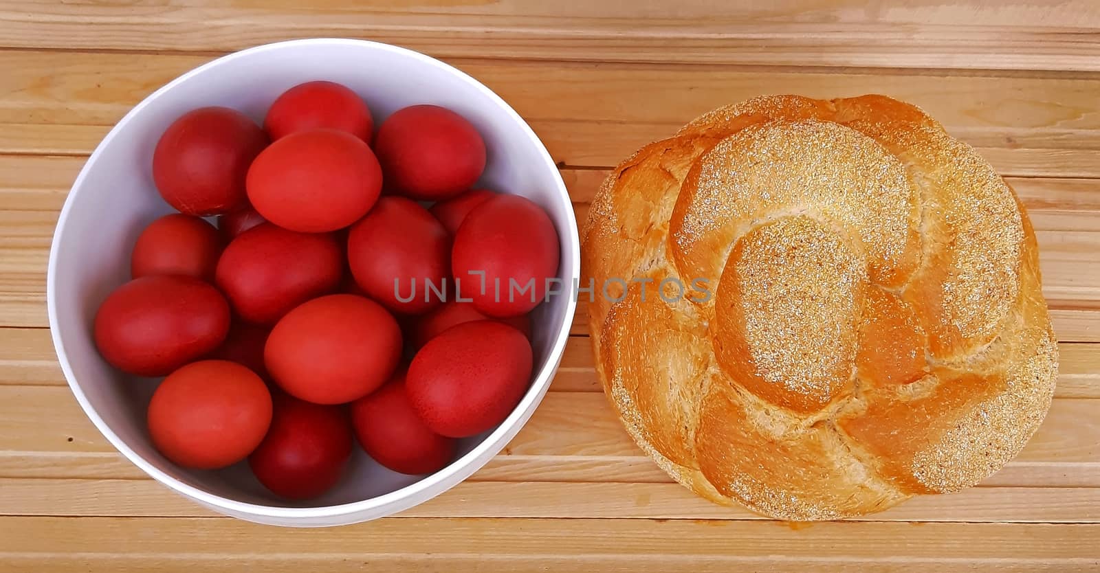 Easter red eggs and home-made bread. Easter holiday. by Mindru
