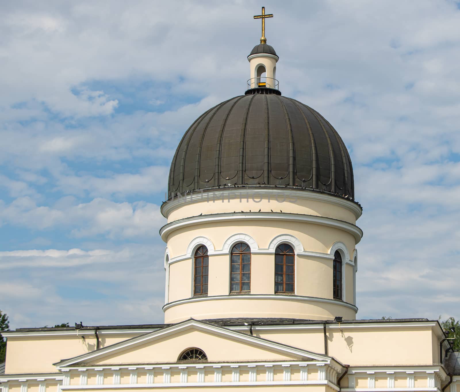 Cathedral Orthodox church close up cloudy background by Mindru