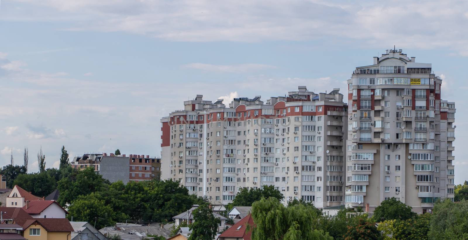 Chisinau, Moldova - July 14, 2019. Apartment building in the city by Mindru
