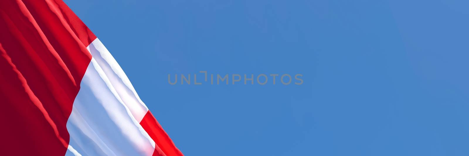 3D rendering of the national flag of Peru waving in the wind against a blue sky