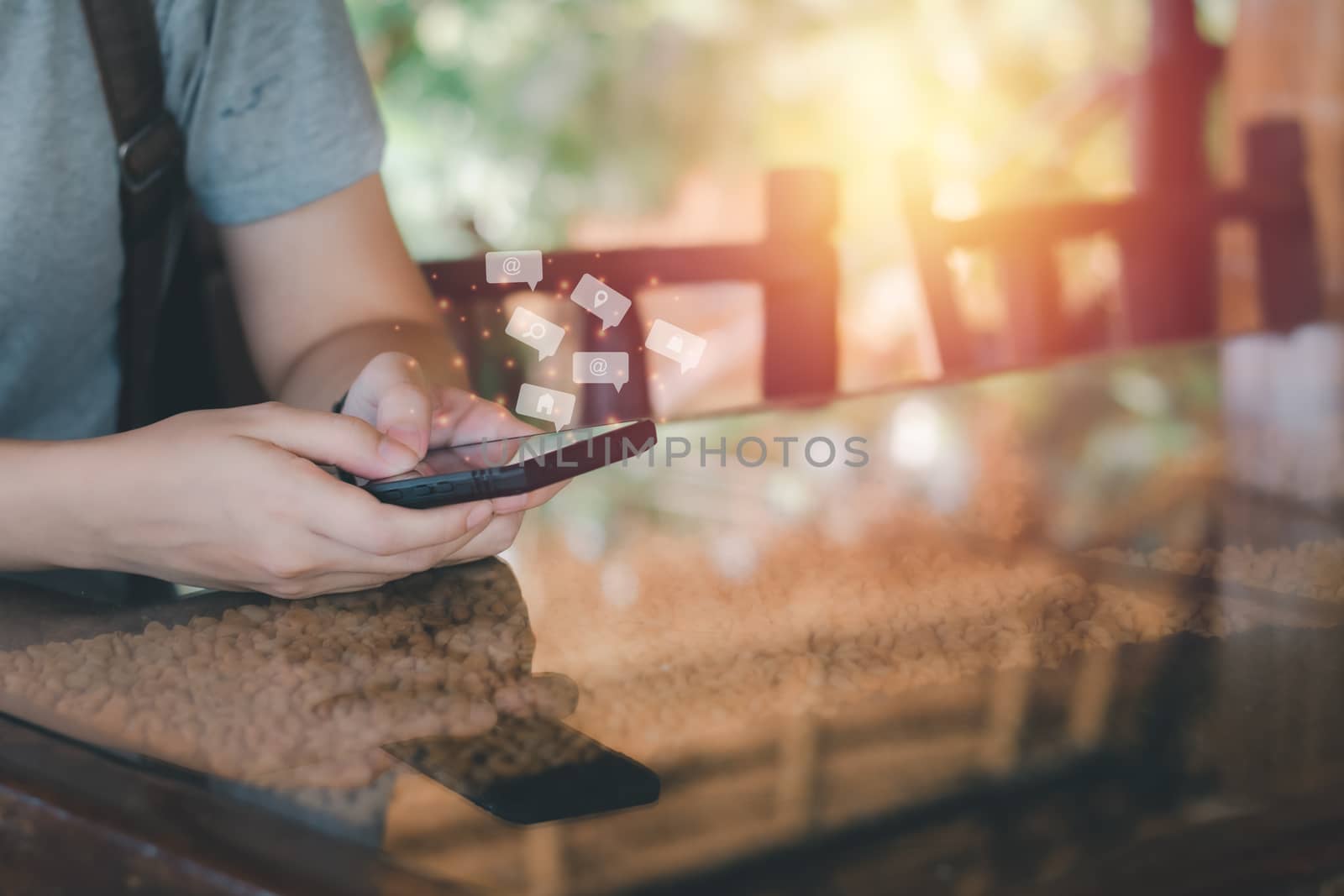 Social media with smartphone concept. Hand holding black mobile  by iiinuthiii