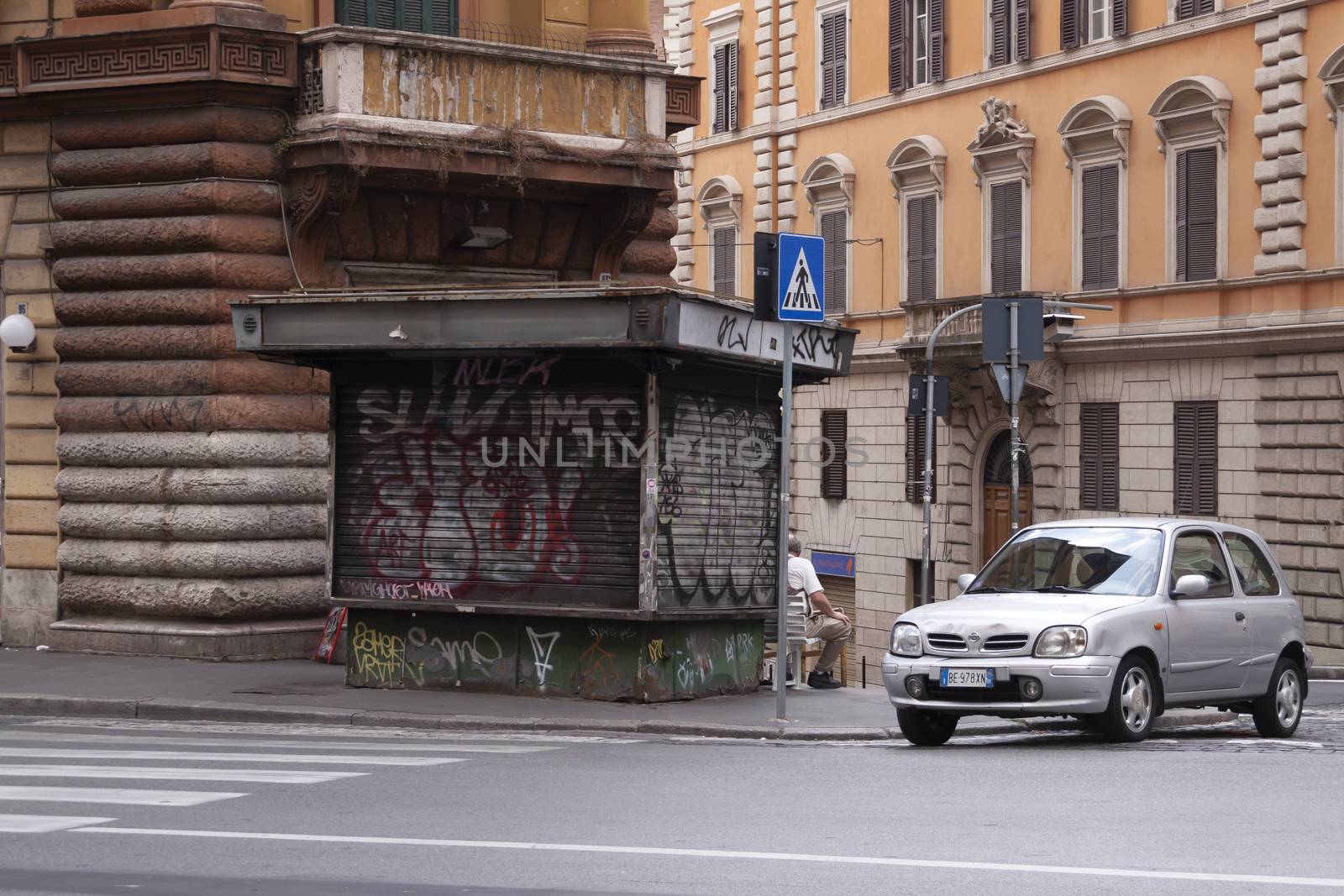 Rome, Italy - June 27, 2010: A car parked in Rome by alvarobueno