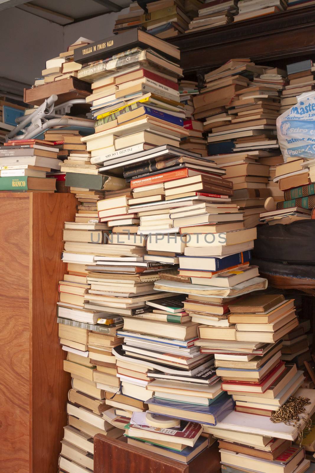 Rome, Italy - June 28, 2010: Stacks of old books by alvarobueno