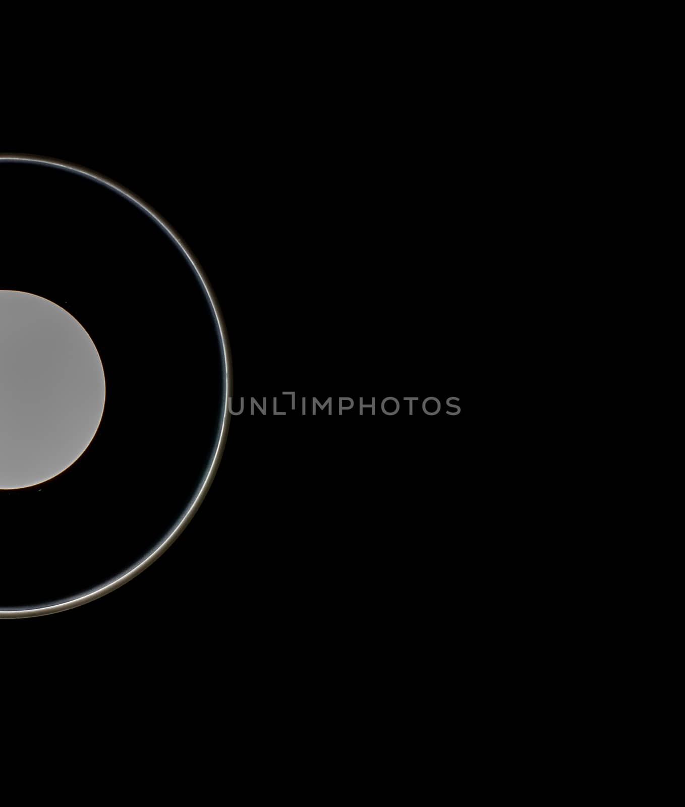 White glowing circles on a black background. There is a place to insert text, a texture. Simple way