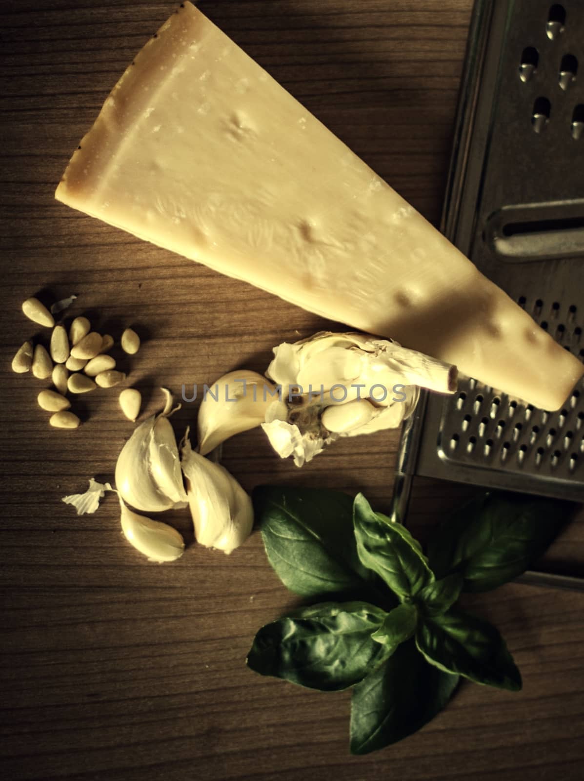 Parmesan cheese with mint and garlic on the table. Dinner concept.