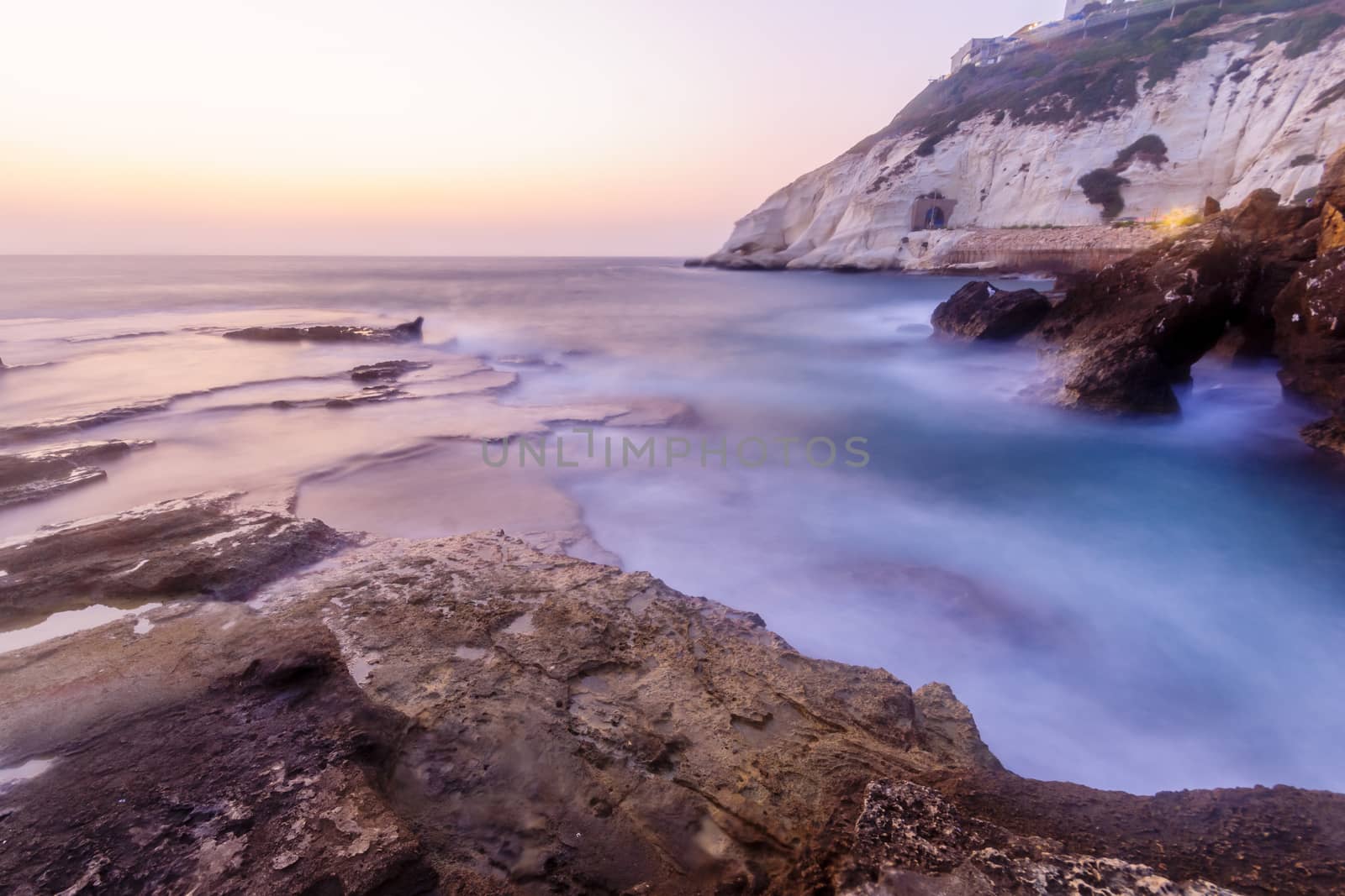View of the blue hour (after sunset) with the coast and cliffs of Rosh HaNikra, Northern Israel