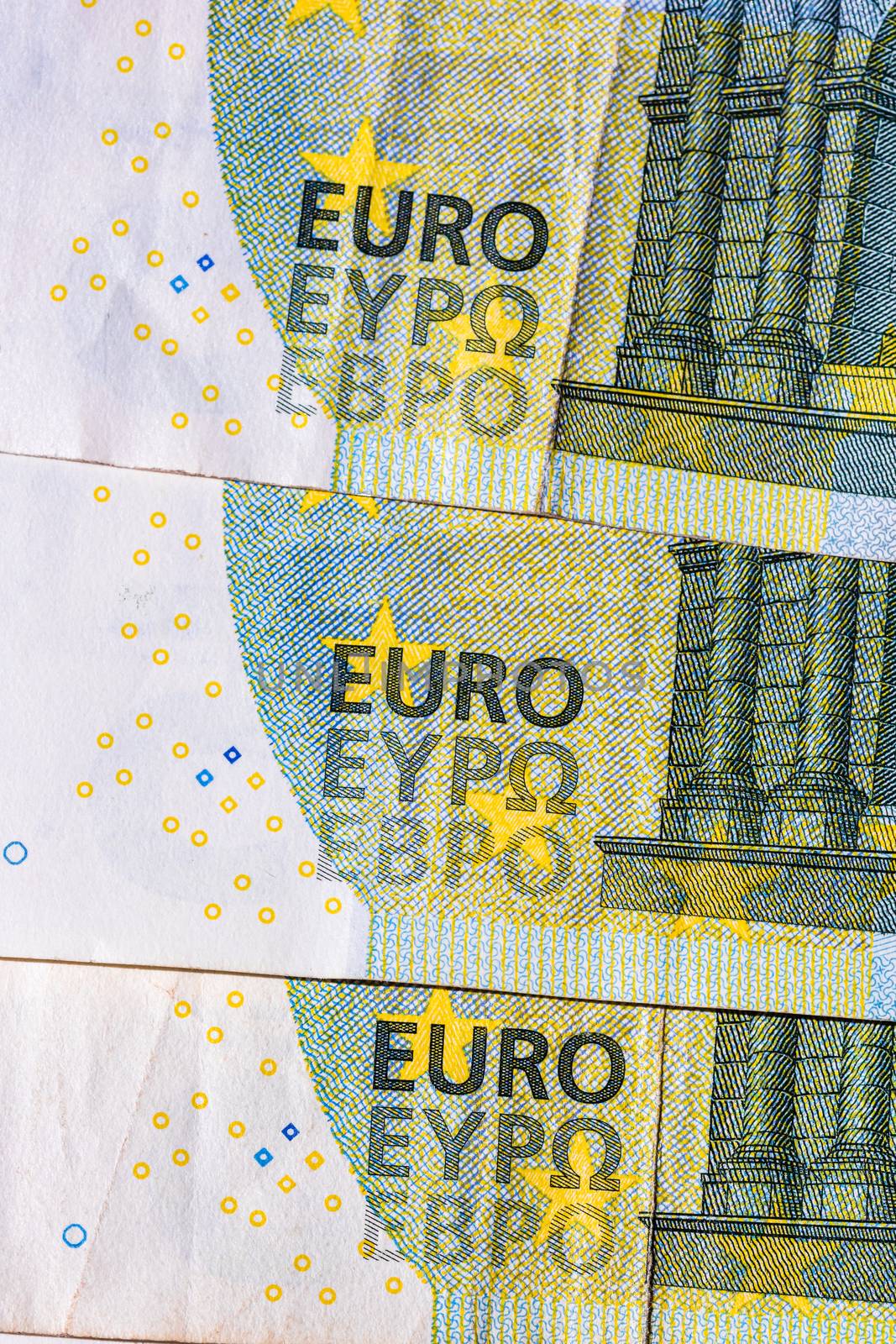 Selective focus on detail of euro banknotes. Close up macro detail of money banknotes, 5 euro isolated. World money concept, inflation and economy concept