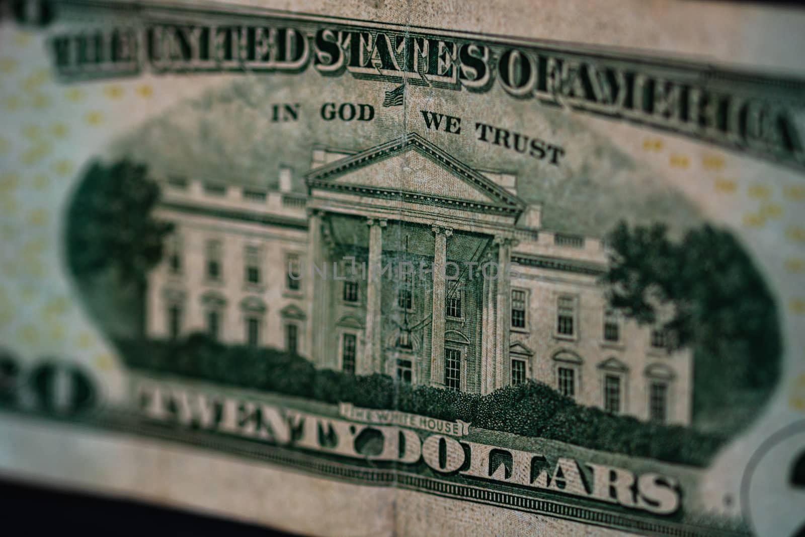 Selective focus on detail of 20 dollars banknote. Close up macro by vladispas