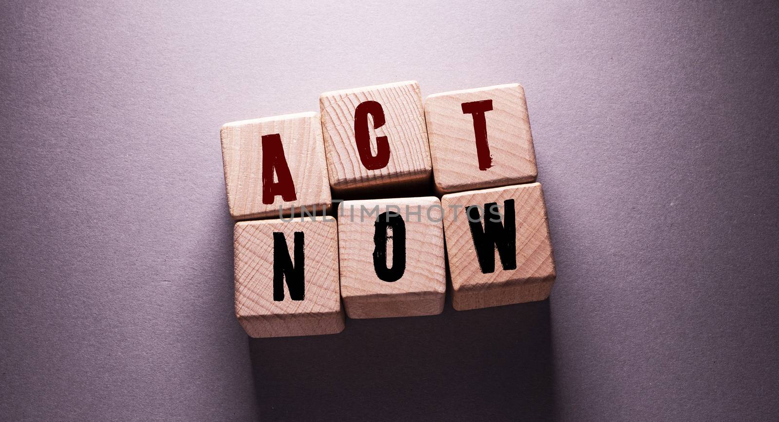 Act now Word Written on Wooden Cubes