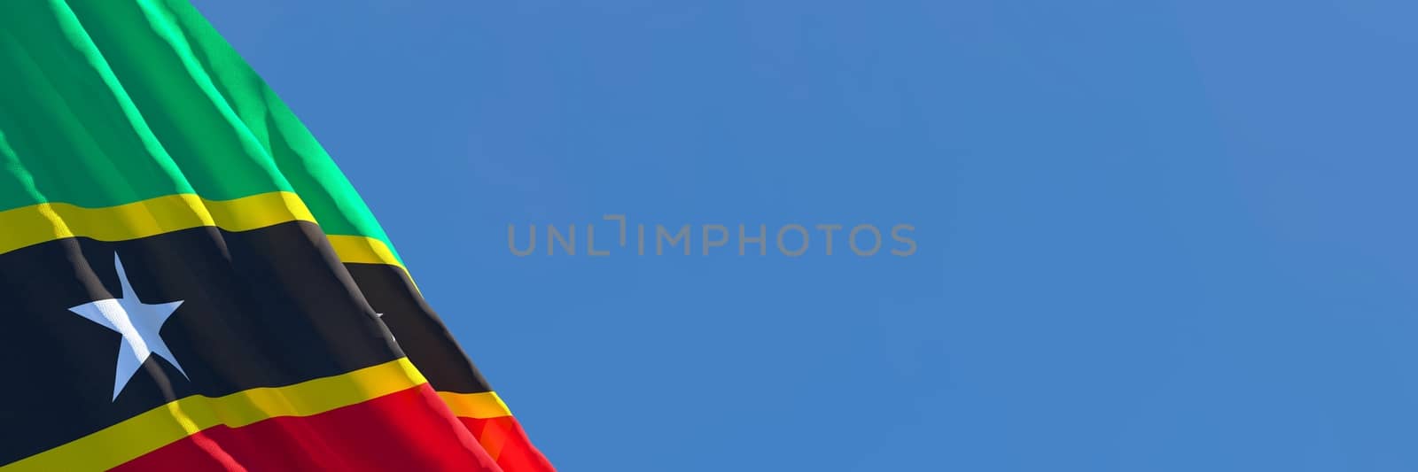 3D rendering of the national flag of Saint Kitts and Nevis waving in the wind against a blue sky