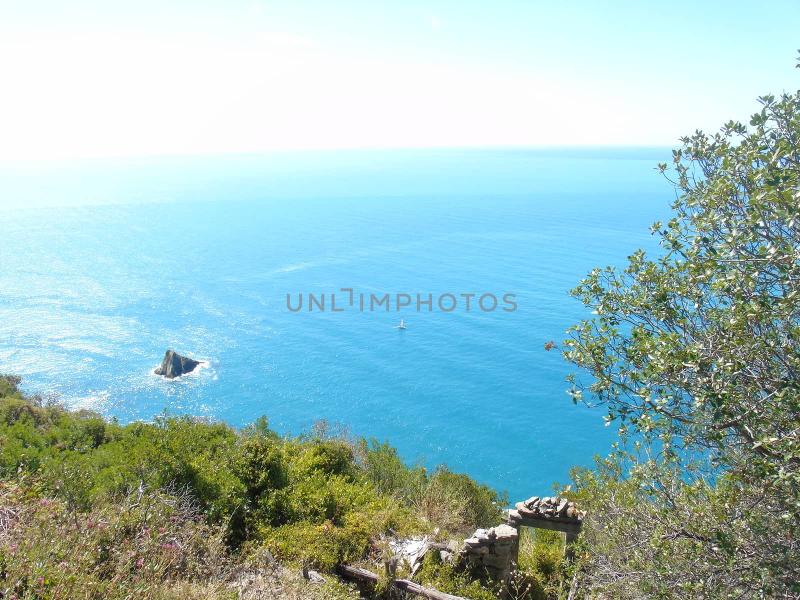 Liguria, Italy - 09/01/2020: Steep stairway overlooking the sea leading to the town of Monesteroli, in Liguria.