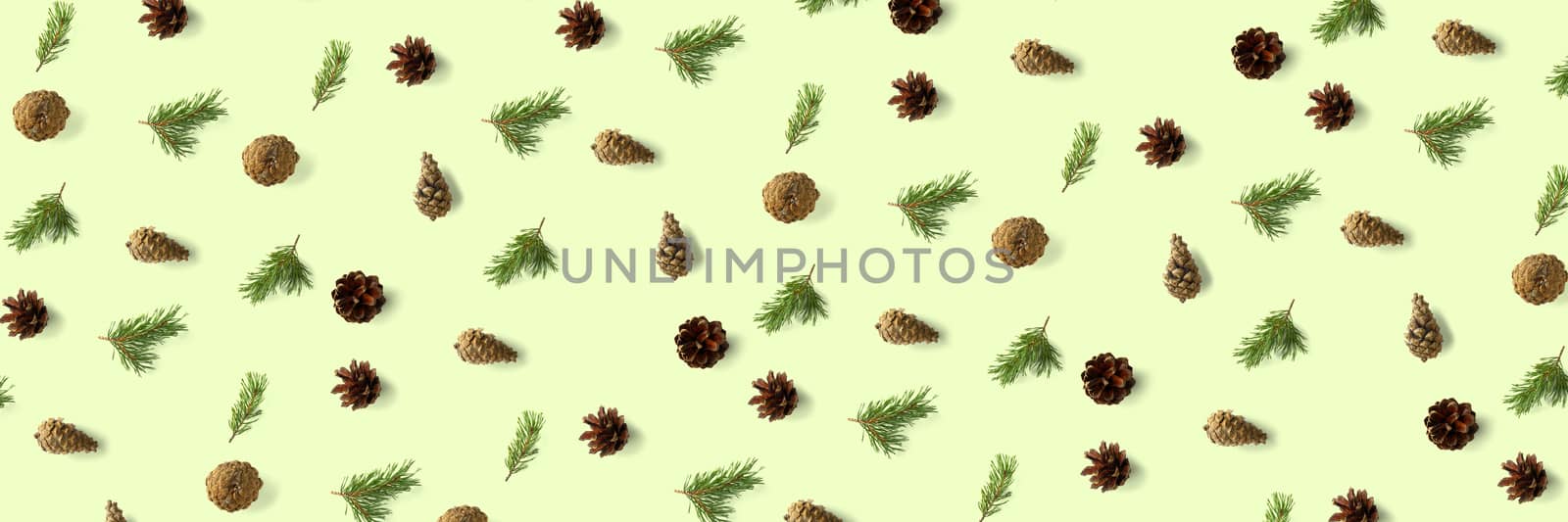 Pine cone Christmas background on green. Pine branches and cones. minimal creative cone arrangement pattern. flat lay, Modern christmas Background. by PhotoTime