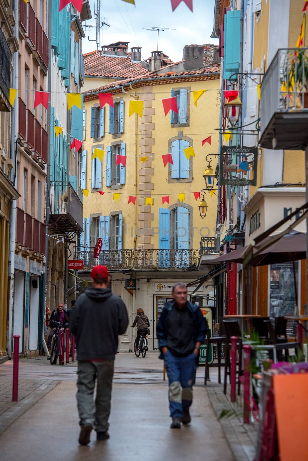 Foix, France :  2020 09 Sept, : People walk in the street of the village Foix in the south of France, Europe