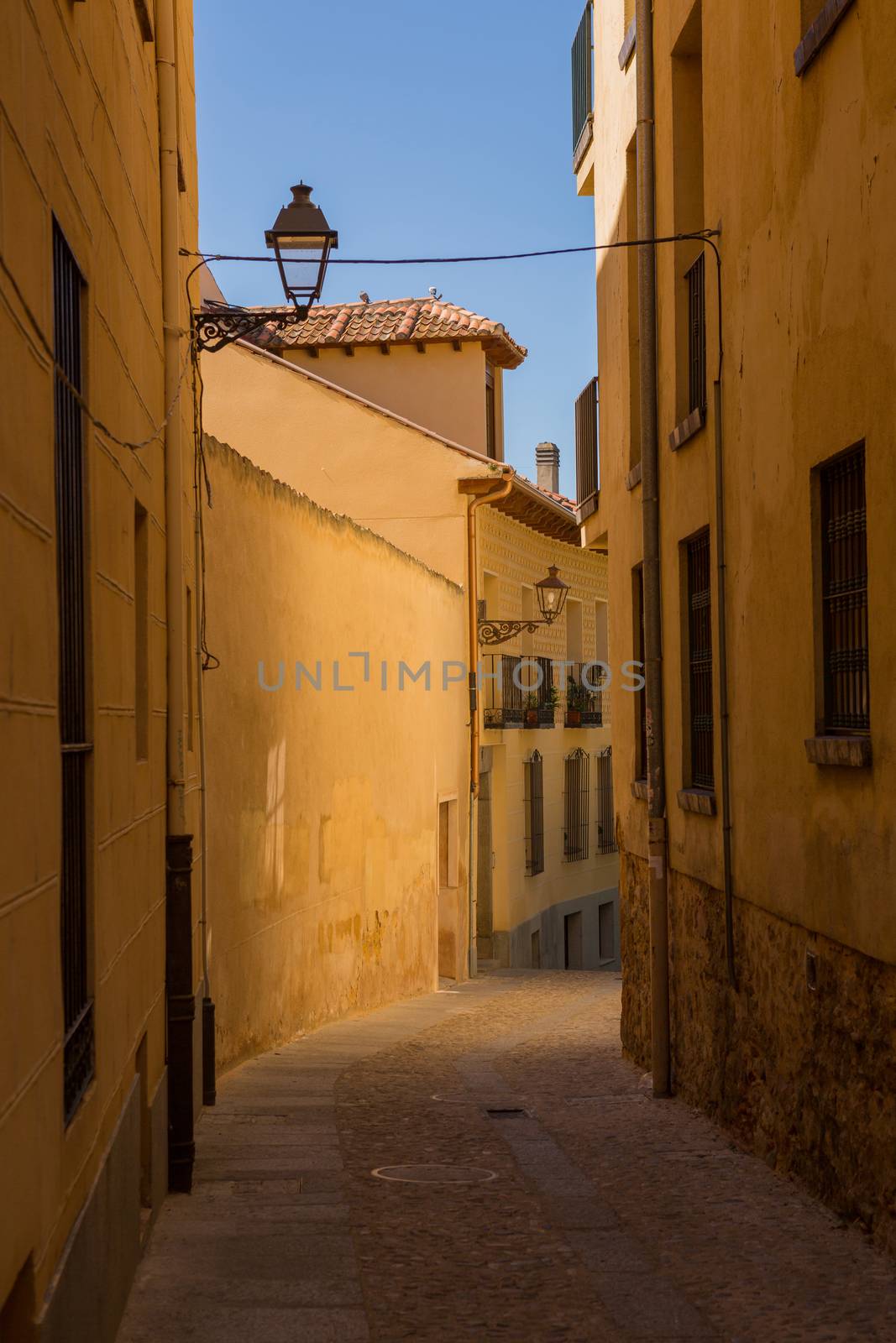 Segovia, Spain - April 26, 2019: Segovia narrow street in Castile La Mancha, Spain