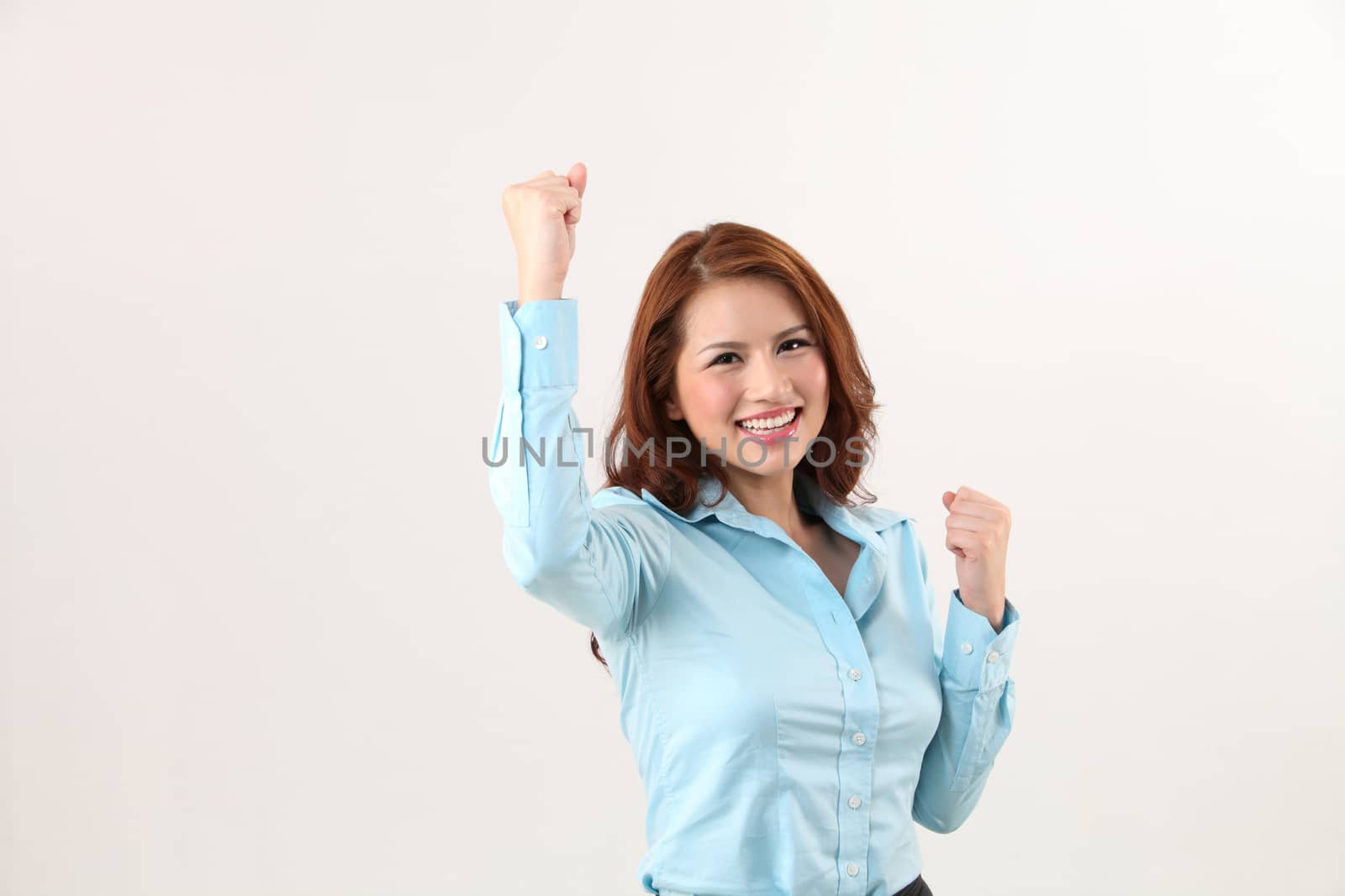 office lady  with arm raising- cheerful