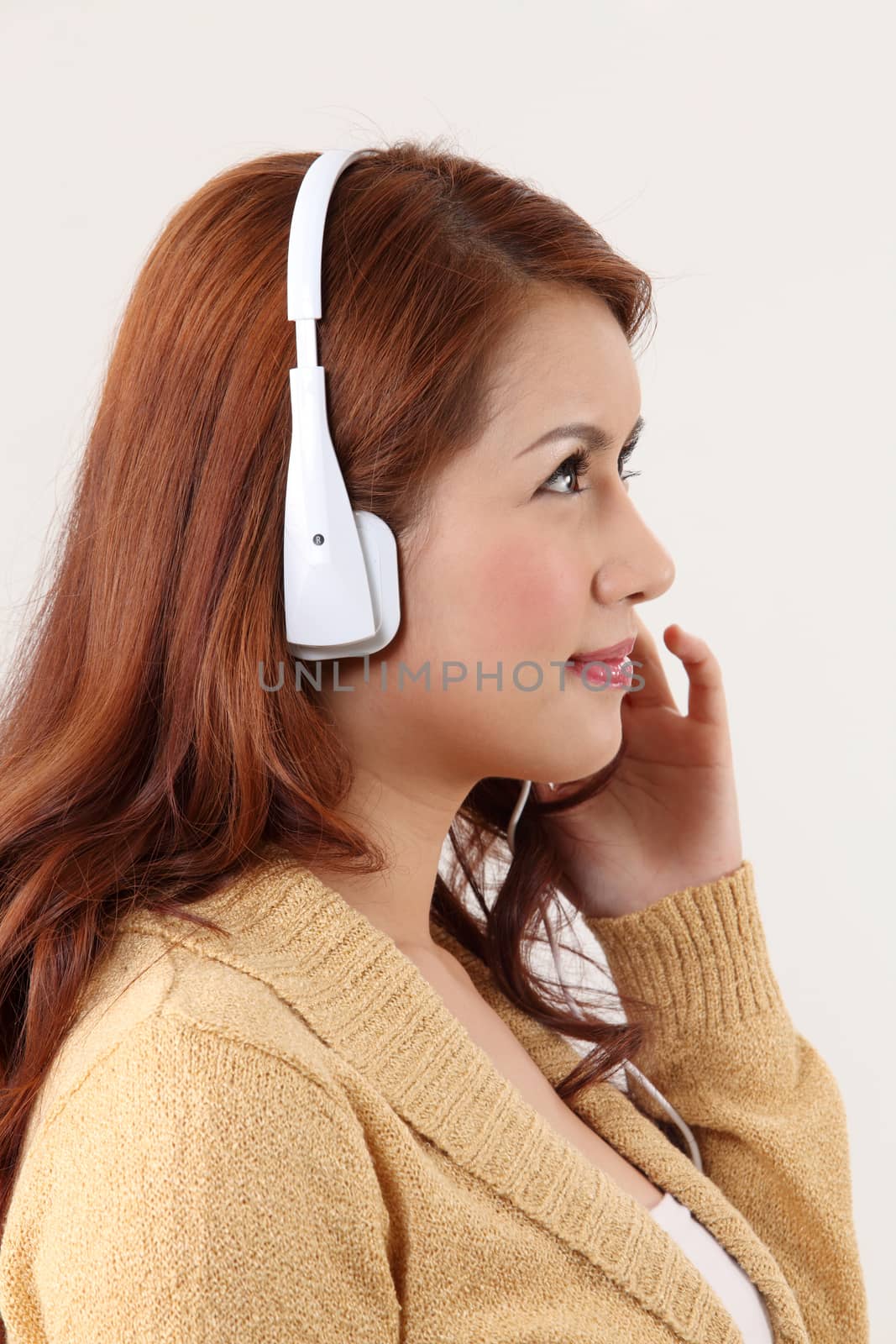 Young woman listening to music