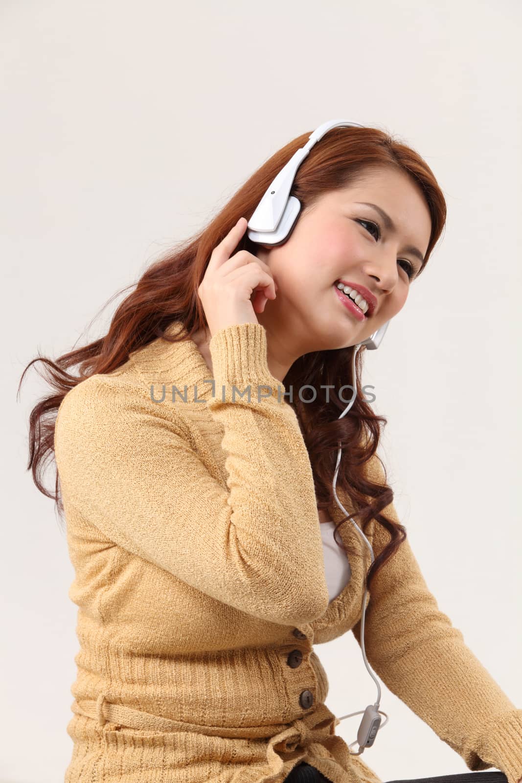 Young woman listening to music