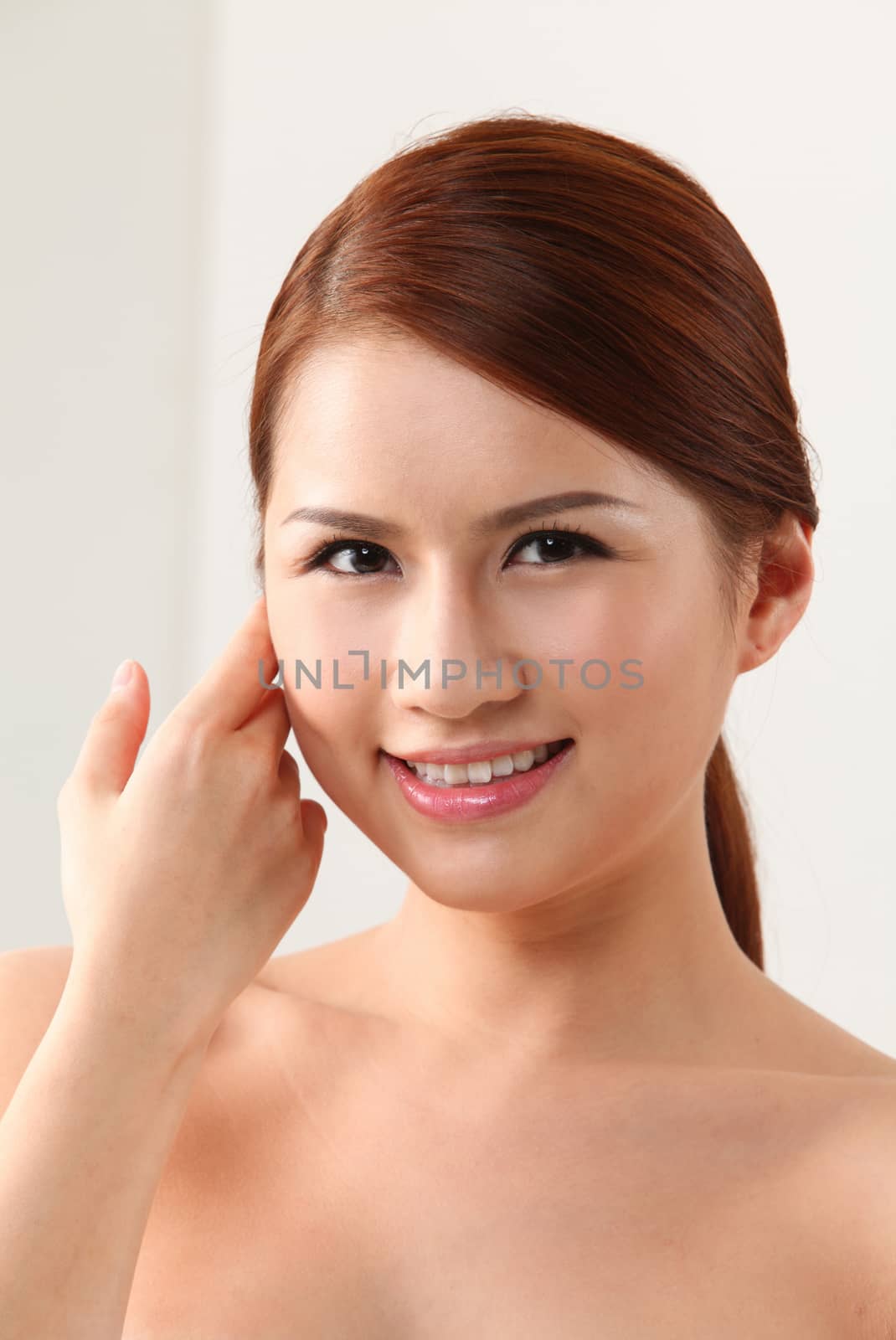  Woman Touching Her Face on the white background
