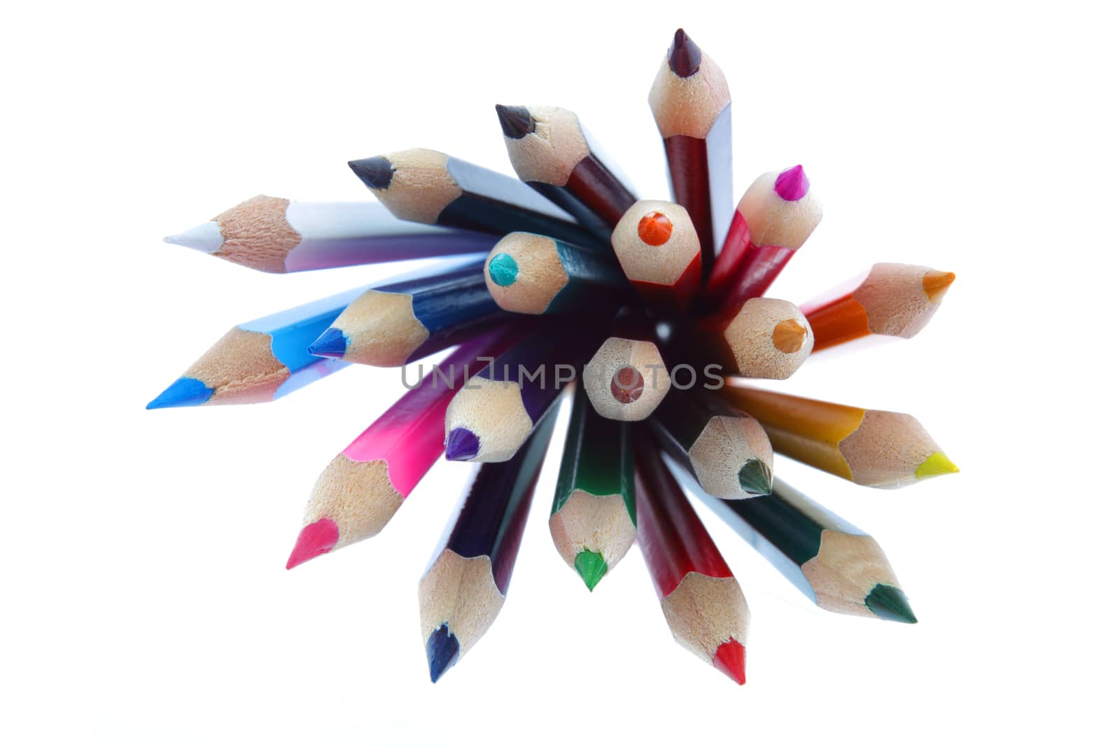 A group of colored pencils on white with selective focus