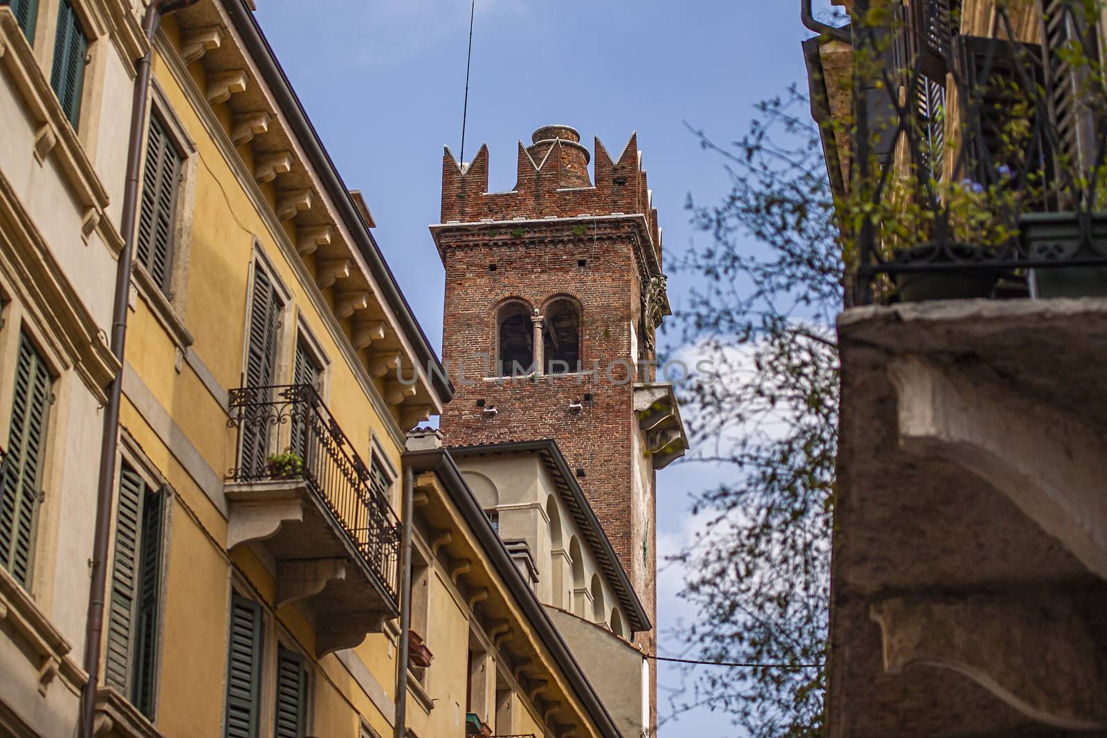 Verona castle tower detail in Piazza delle Erbe, Erbe sqaure in english